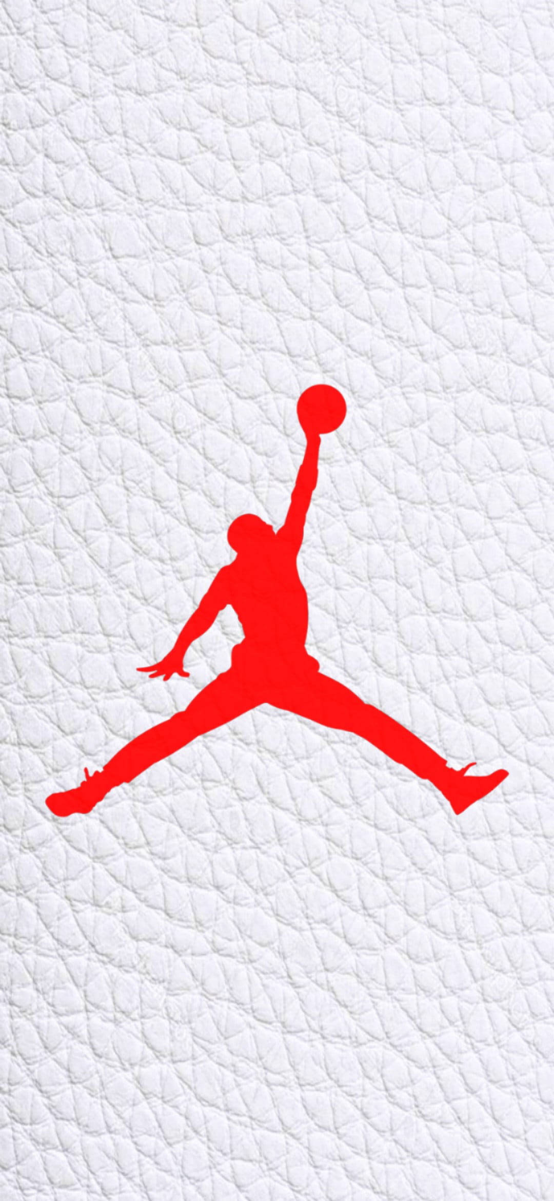 Jordan Logo 桌布 壁紙 — 一個大膽的紅色剪影，標誌性的Jordan標誌在紋理白色皮革背景上跳躍。