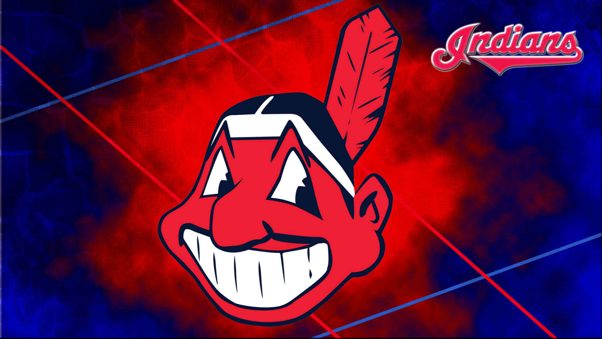 MLB Teams 桌布 壁紙 — 一個大膽的紅色卡通美洲原住民吉祥物頭像，帶有羽毛和白色牙齒，背景是火紅和電藍色，帶有對角線。