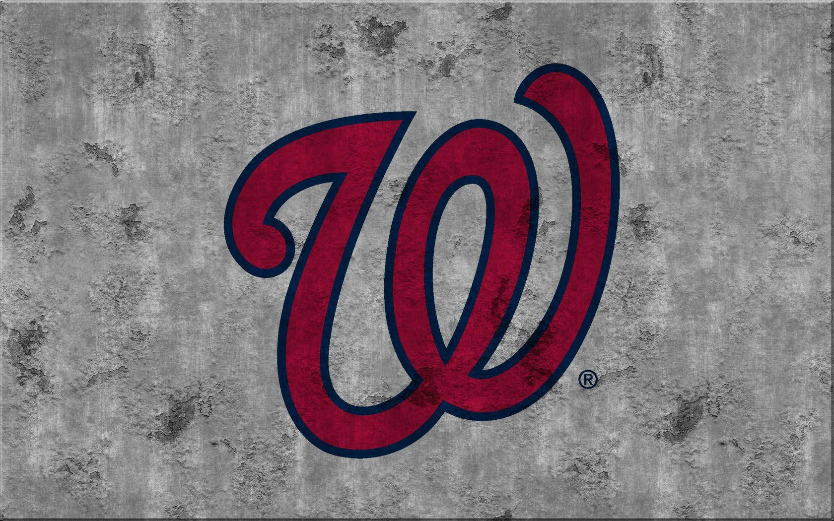 Nationals 桌布 壁紙 — 一個大膽的紅色和深藍色'W'標誌，帶有磨損質感，在風化的灰色混凝土背景上脫穎而出。