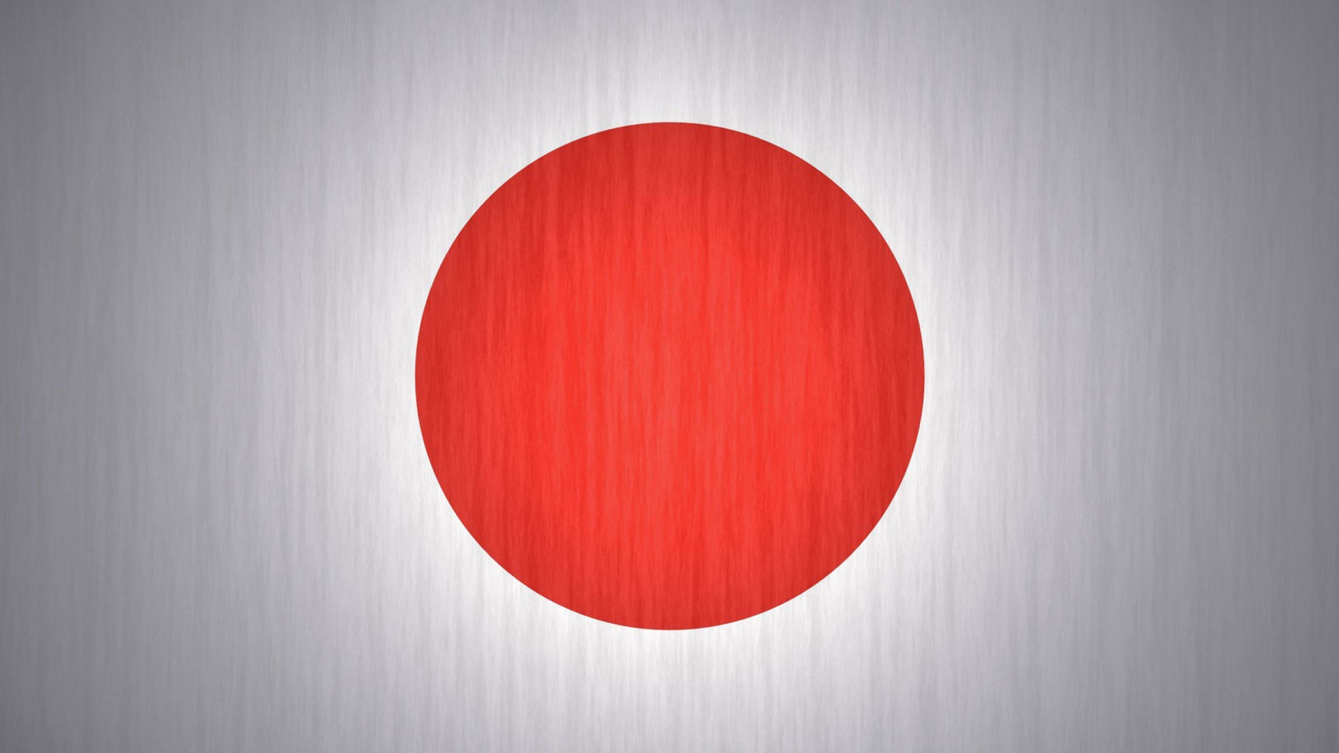 拉絲銀金屬紋理背景上的紅色圓圈。