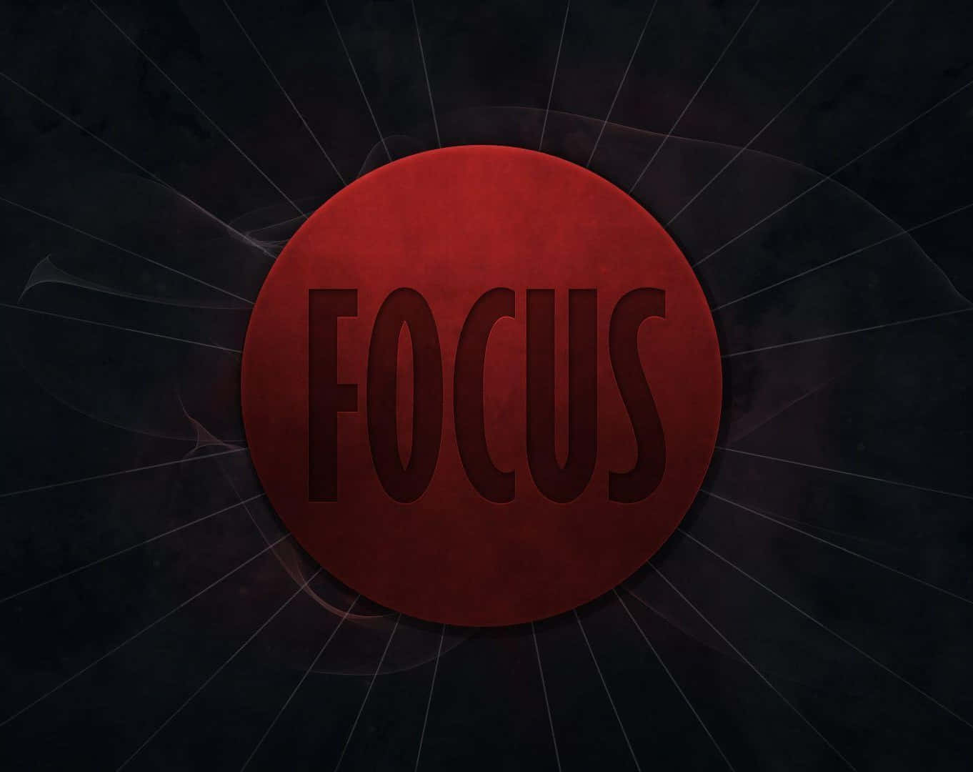 Focus 桌布 壁紙 — 一個大膽的紅色圓形標誌，帶有「focus」字樣，在帶有微妙幾何線條的深色紋理背景上散發光芒。