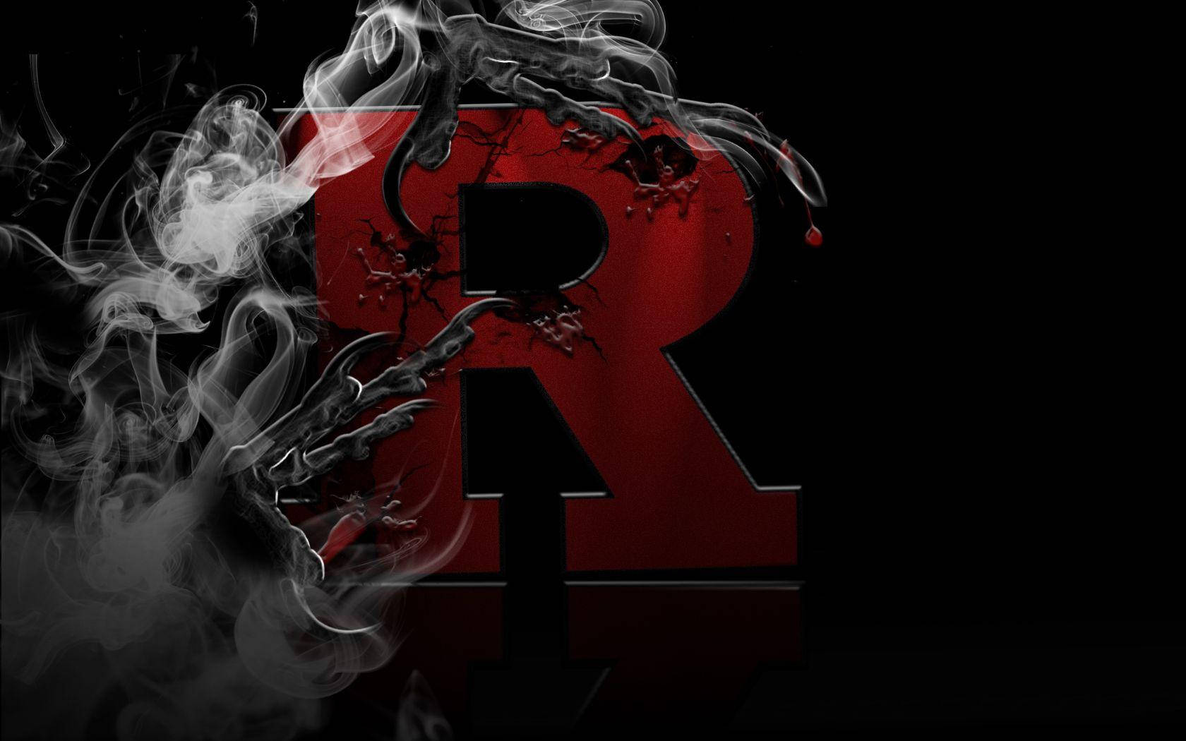 R 桌布 壁紙 — 一個大膽的紅色字母R，帶有爪子的手從黑色背景上的旋轉煙霧中出現。