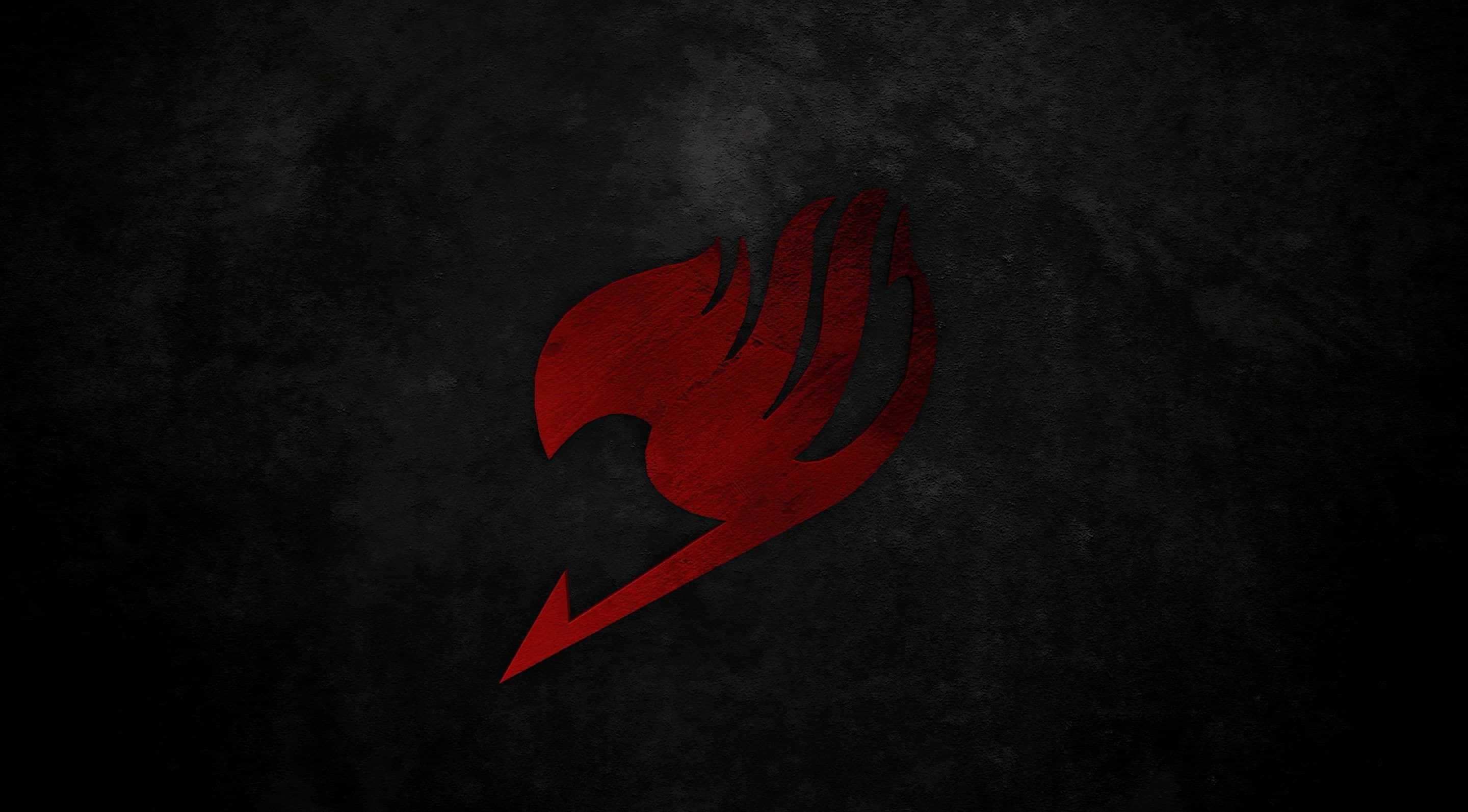 Fairy Tail Logo 桌布 壁紙 — 一個大膽的紅色火焰標誌在紋理深灰色混凝土牆上發光。