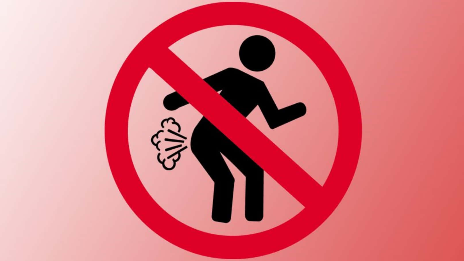 Fart 桌布 壁紙 — 一個大膽的紅色禁止標誌，在漸變粉紅色背景上以黑色火柴人圖示禁止公共排便。