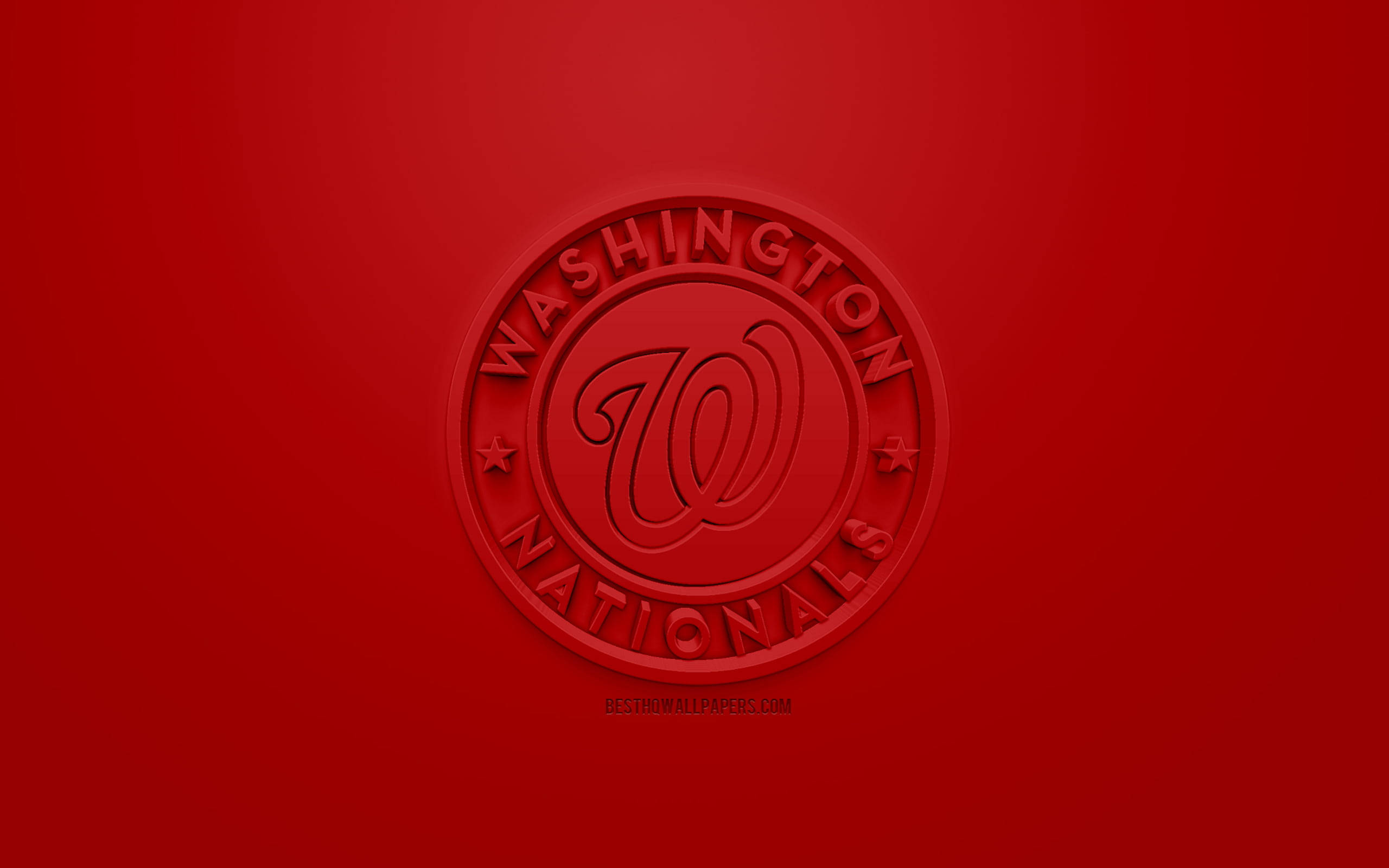 Nationals 桌布 壁紙 — 一個大膽的紅色華盛頓國民隊標誌，壓印在漸變紅色背景上，帶有微妙的燈光效果。