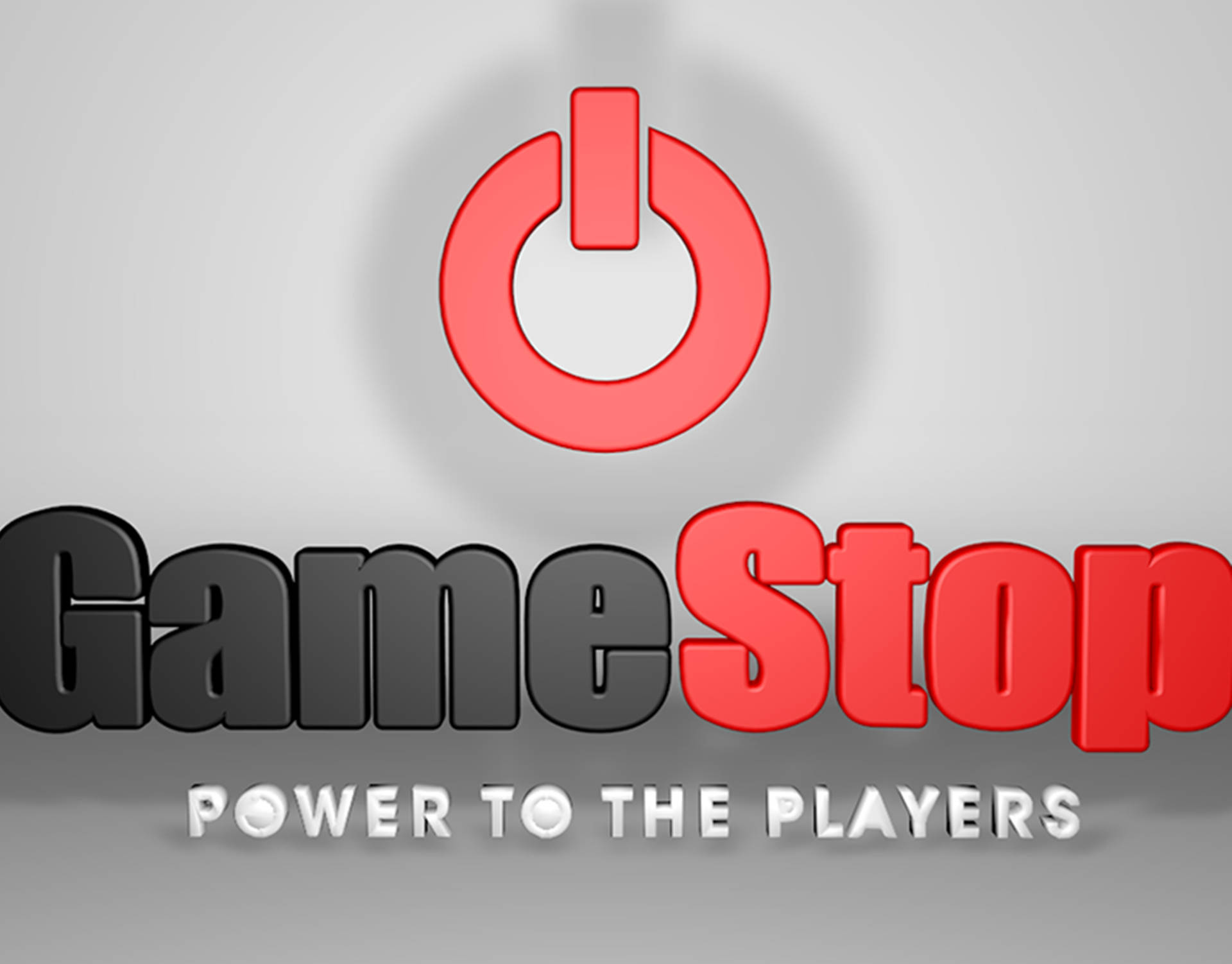 GameStop 桌布 壁紙 — 一個大膽的紅色電源符號和帶有3D文字的GameStop標誌，位於漸變灰色背景上。