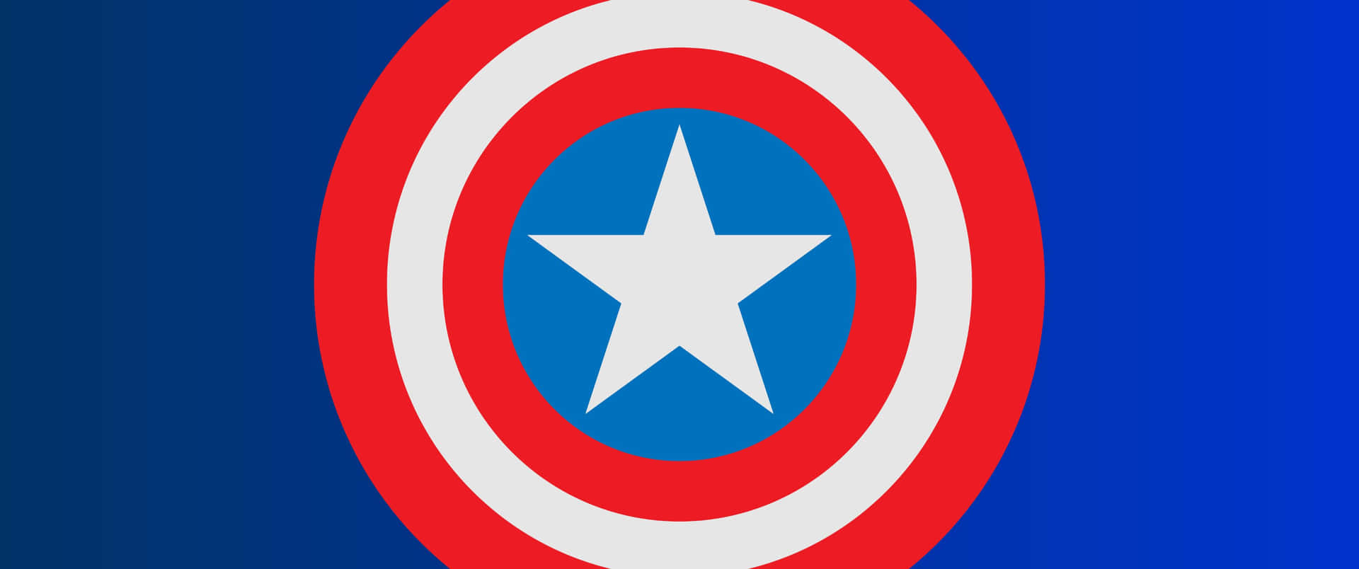 3440x1440p Captain America 桌布 壁紙 — 一個大膽的美國隊長盾牌，帶有紅、白、藍同心圓和一個白色星星，位於深藍色漸變背景中央。