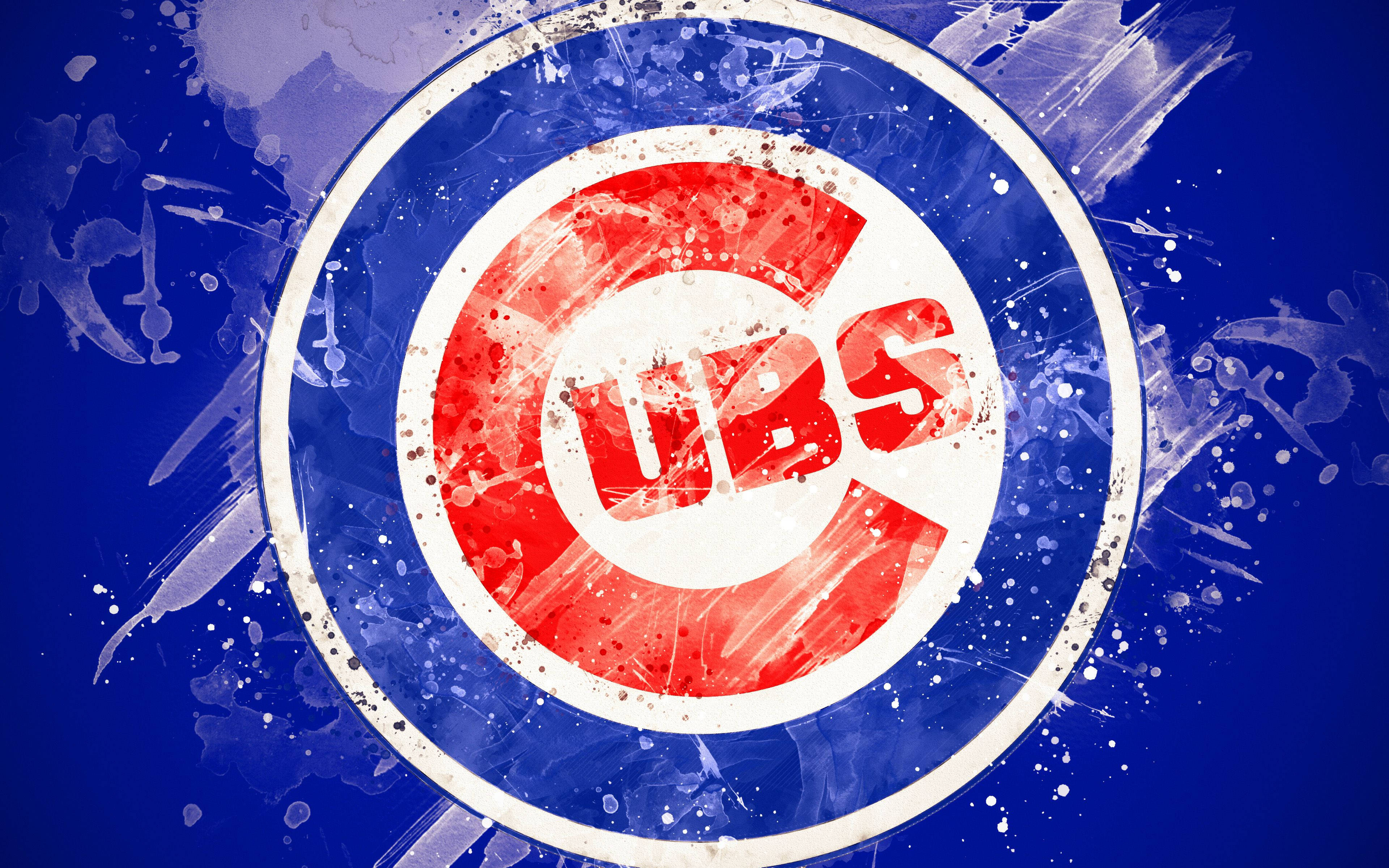 Cubs 桌布 壁紙 — 一個大膽的芝加哥小熊隊標誌，在深藍色背景上濺滿紅、白、藍色油漆。