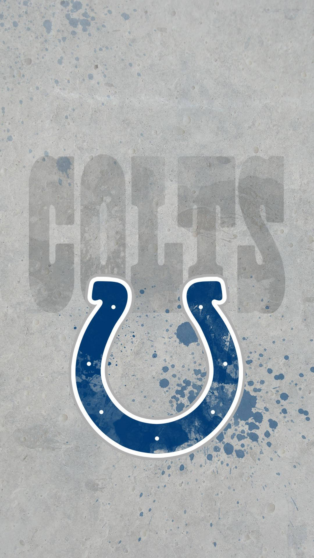 NFL 桌布 壁紙 — 一個大膽的藍色印第安納波利斯小馬隊馬蹄鐵標誌，帶有白色輪廓和油漆飛濺，背景為紋理灰色混凝土。