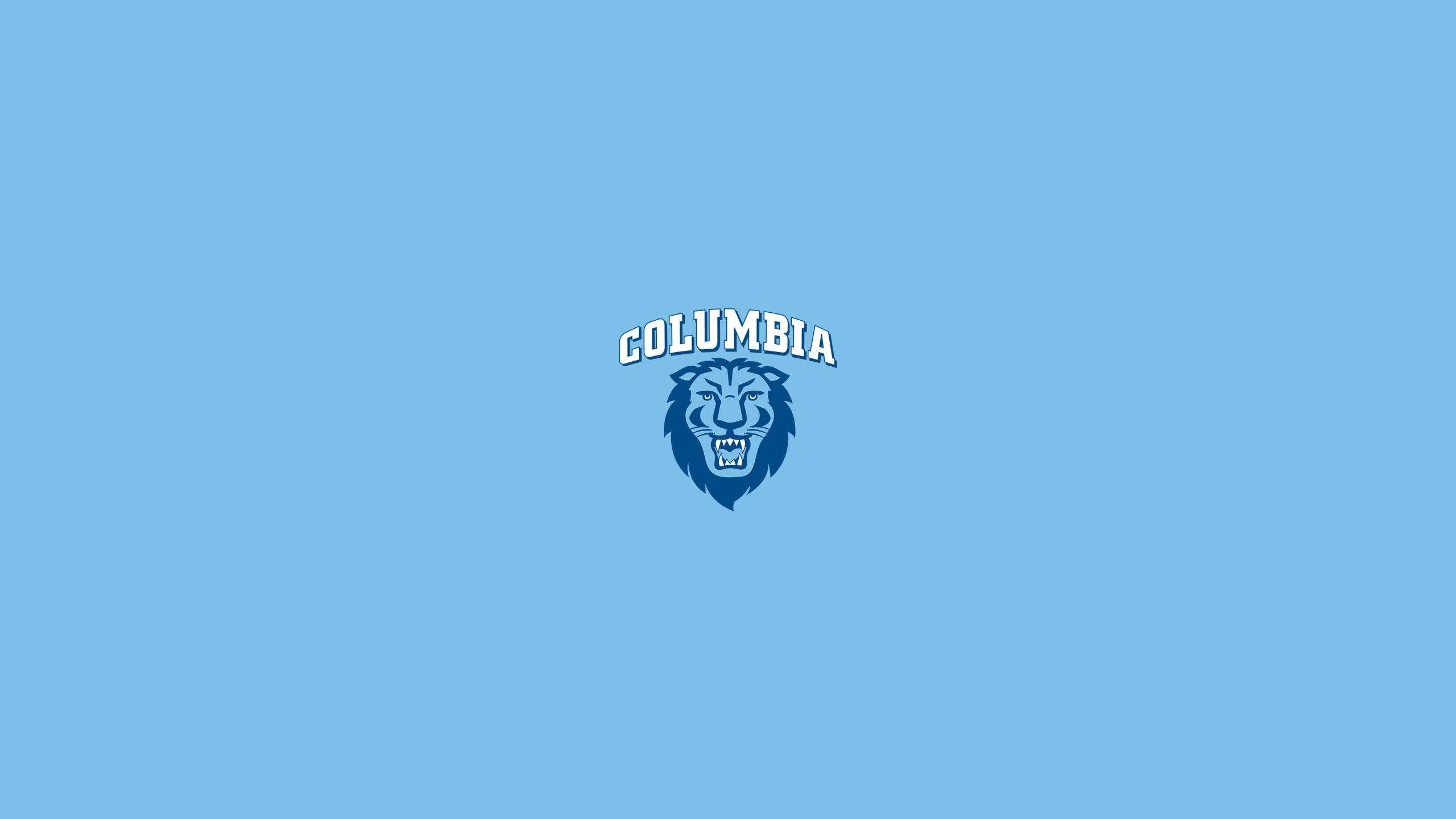 淺藍色 桌布 壁紙 — 一個大膽的藍色獅子頭標誌，上方拱形排列著「COLUMBIA」，背景為純淺藍色。