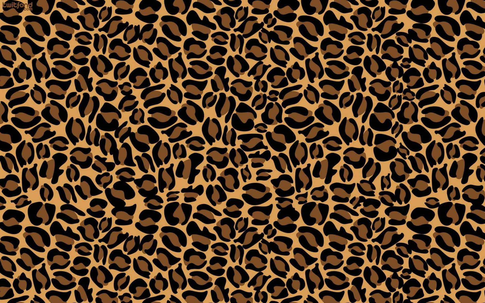 Leopard Pattern 桌布 壁紙 — 一個大膽的豹紋圖案，在棕褐色背景上帶有黑色和棕色斑點。