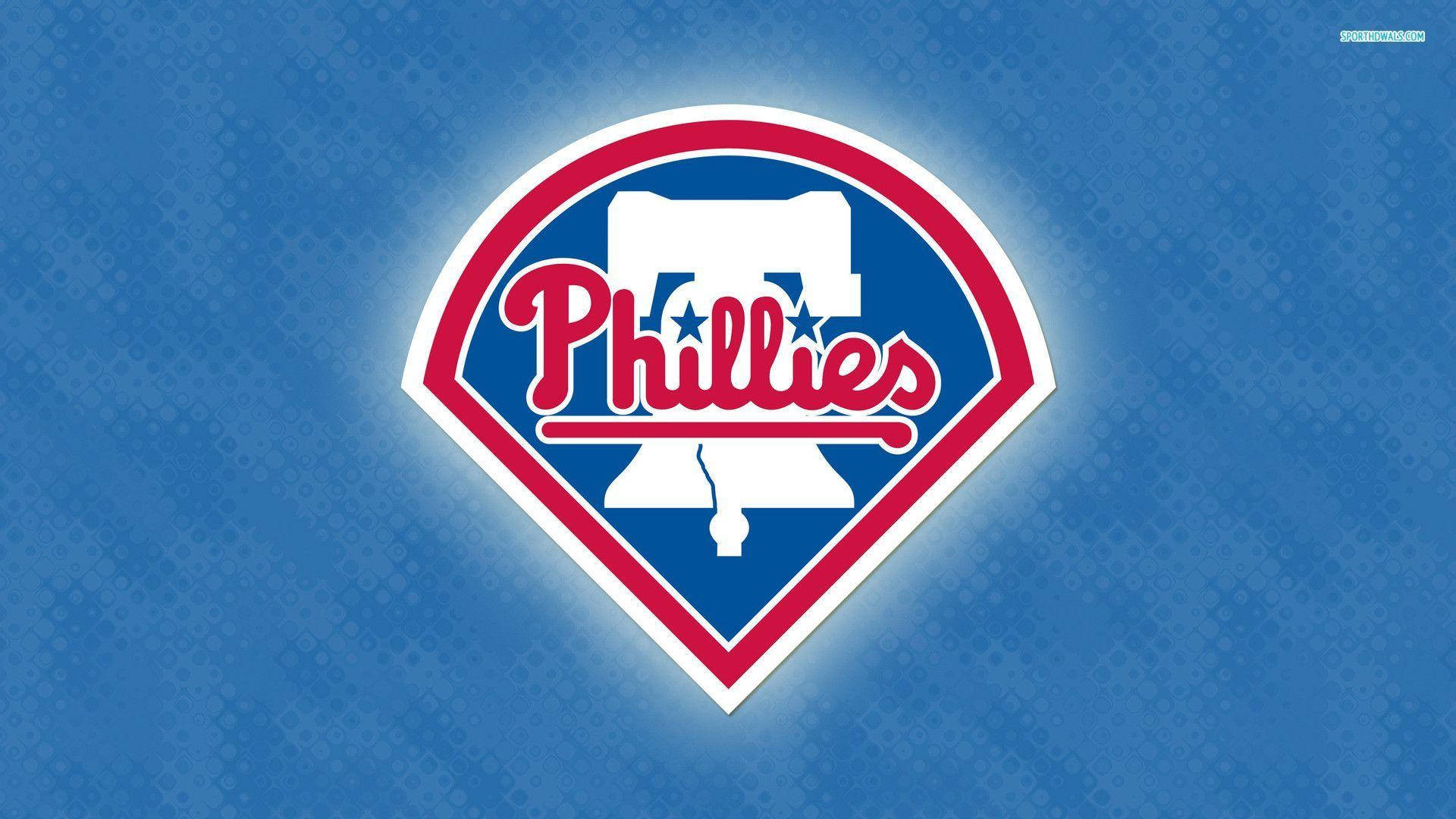 Phillies 桌布 壁紙 — 一個大膽的費城人棒球標誌，以紅、白、藍色在紋理藍色背景上發光。