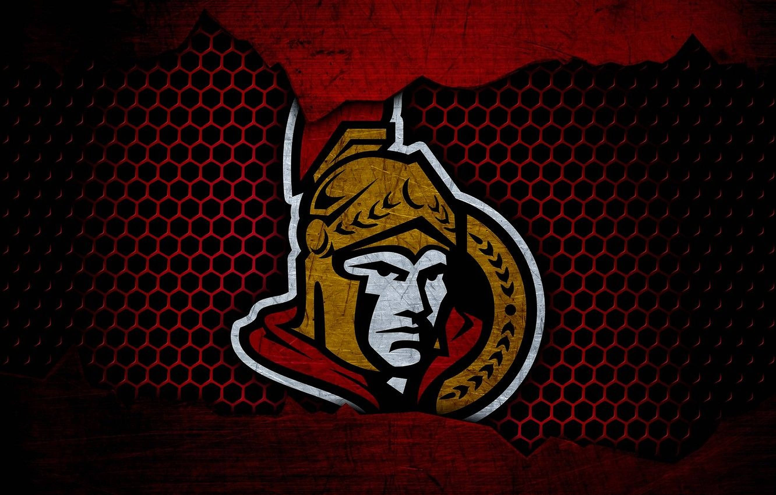 Senators 桌布 壁紙 — 一個大膽的金色斯巴達頭盔標誌從紋理紅黑六角網格背景中浮現。
