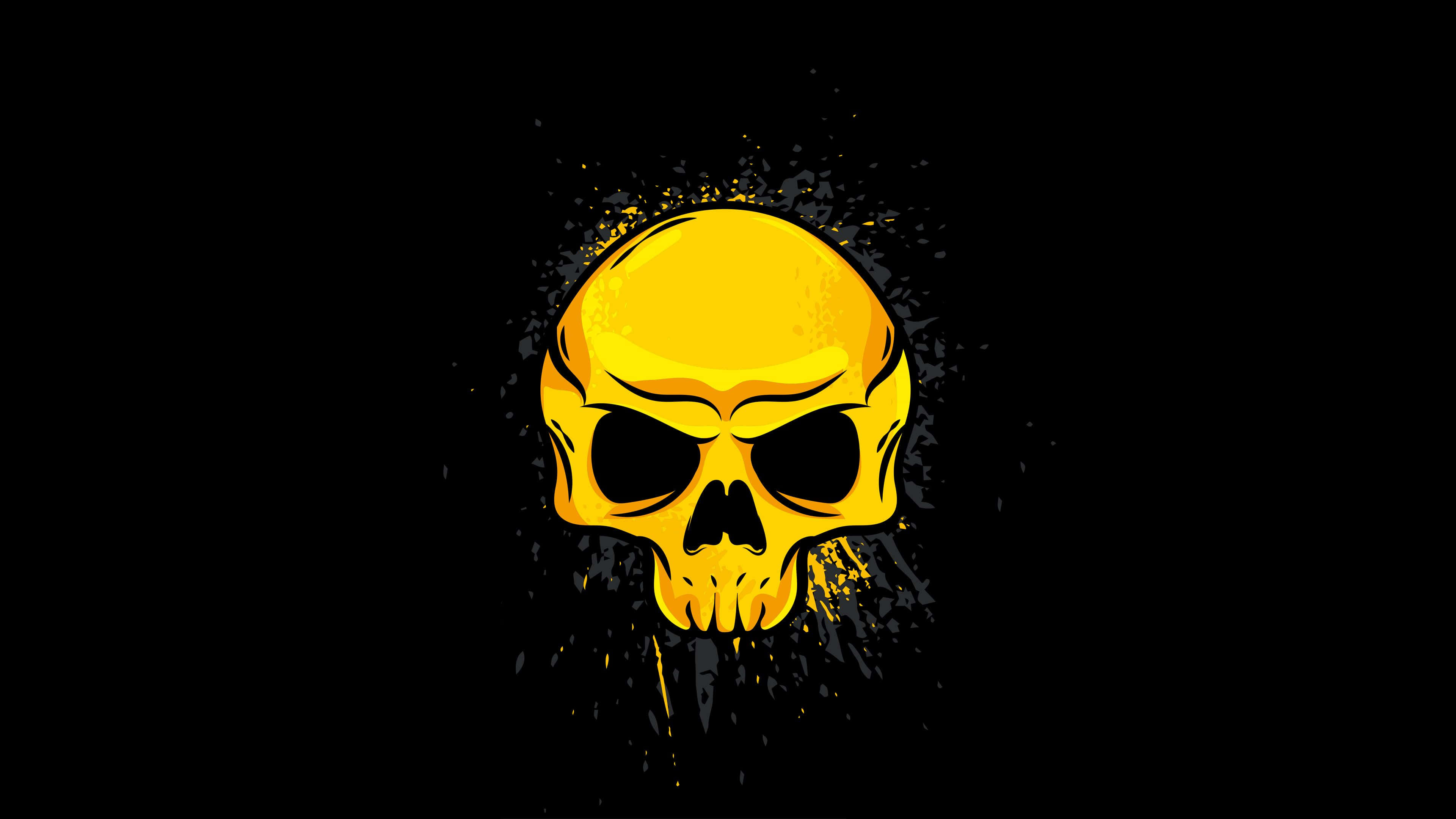 Awesome Skull 桌布 壁紙 — 一個大膽的黃色骷髏頭，帶有憤怒的眉毛，從黑色背景中迸發出來，帶有飛濺效果。