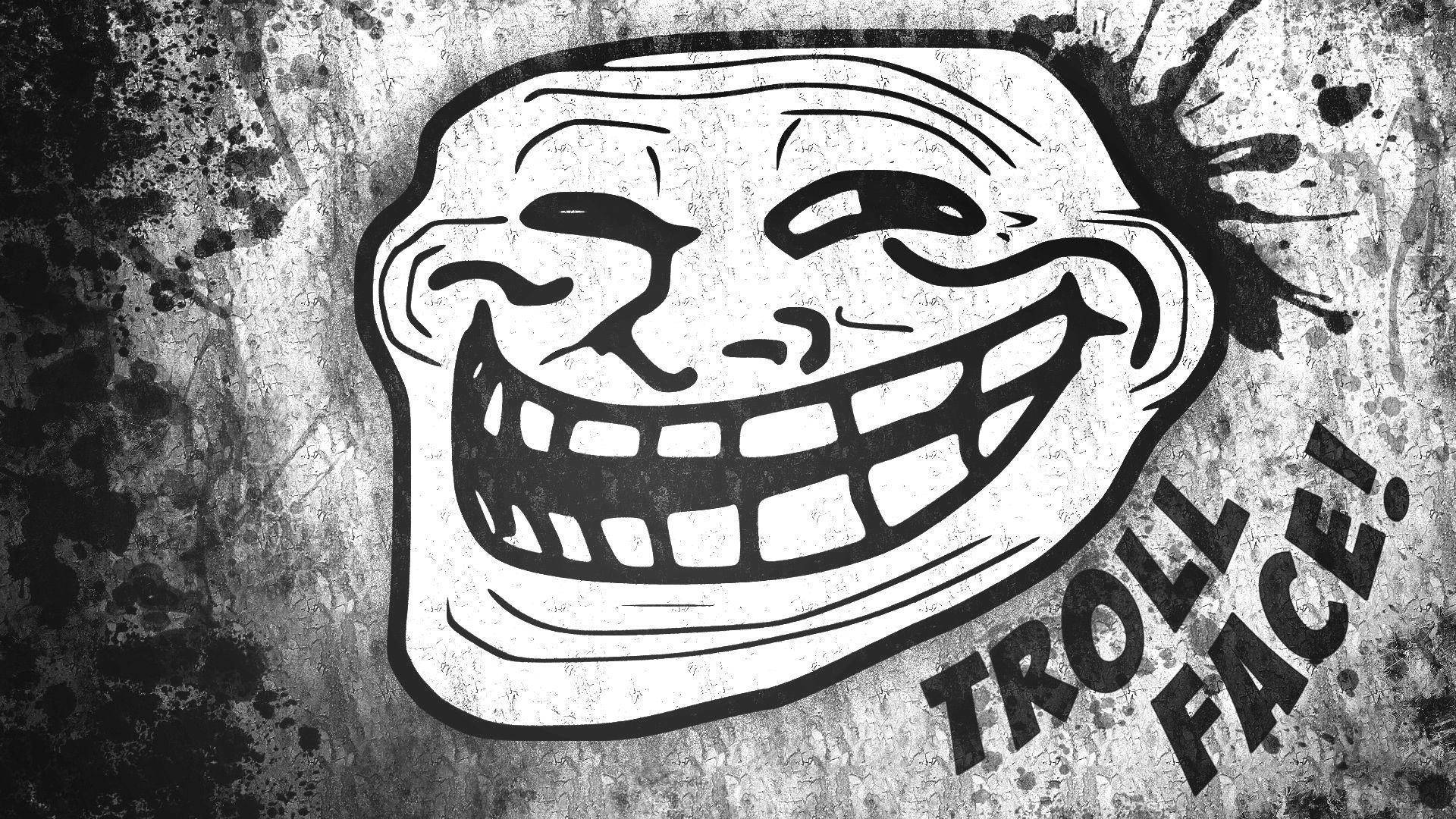 Troll Face 桌布 壁紙 — 一個大膽的黑白 troll 臉插圖，帶有寬闊的笑容和文字，背景是粗糙的紋理。