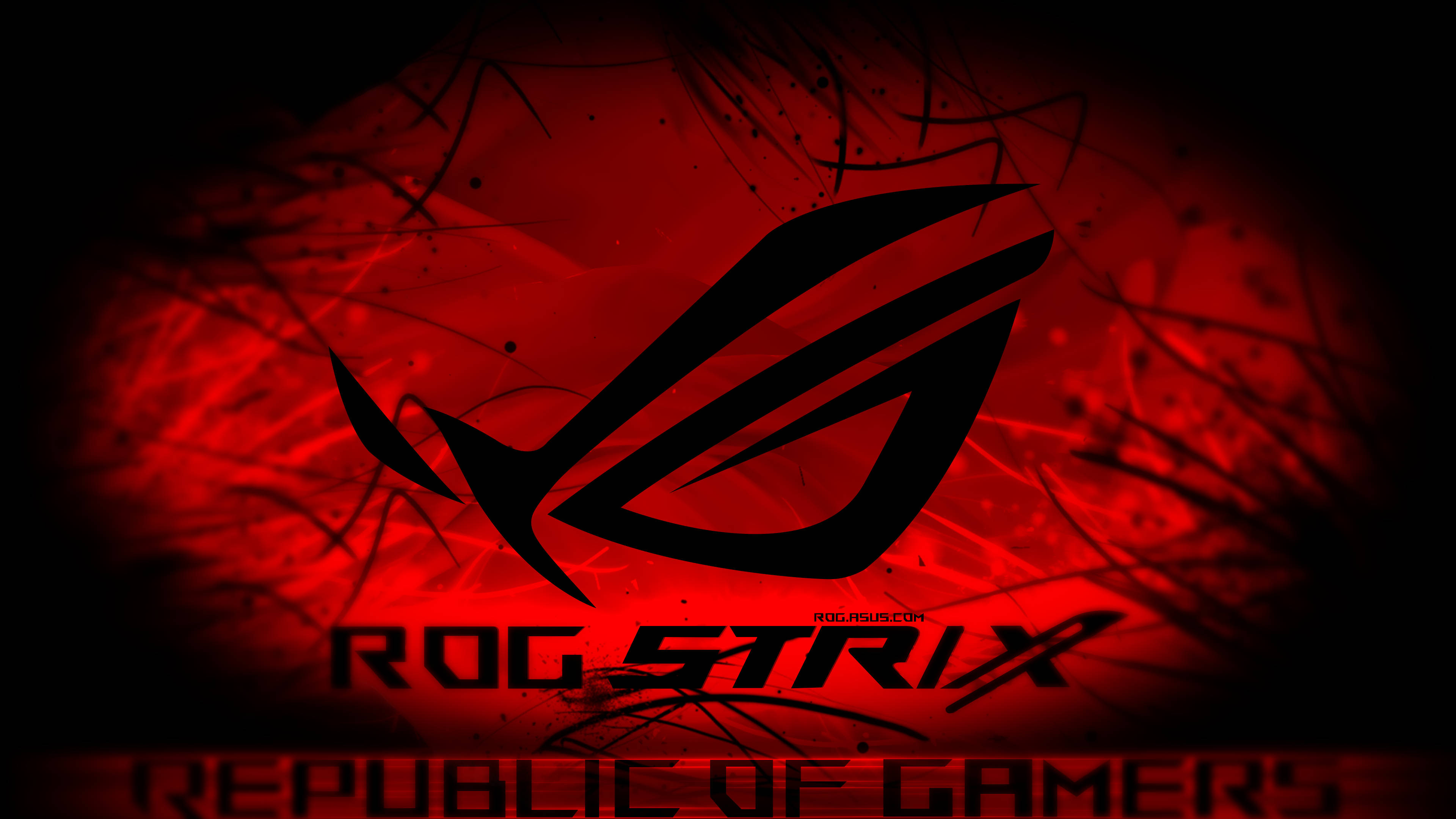 華碩 ROG 桌布 壁紙 — 一個大膽的黑色 ROG Strix 標誌在帶有深色潑濺效果的熾熱紅色抽象背景上發光。