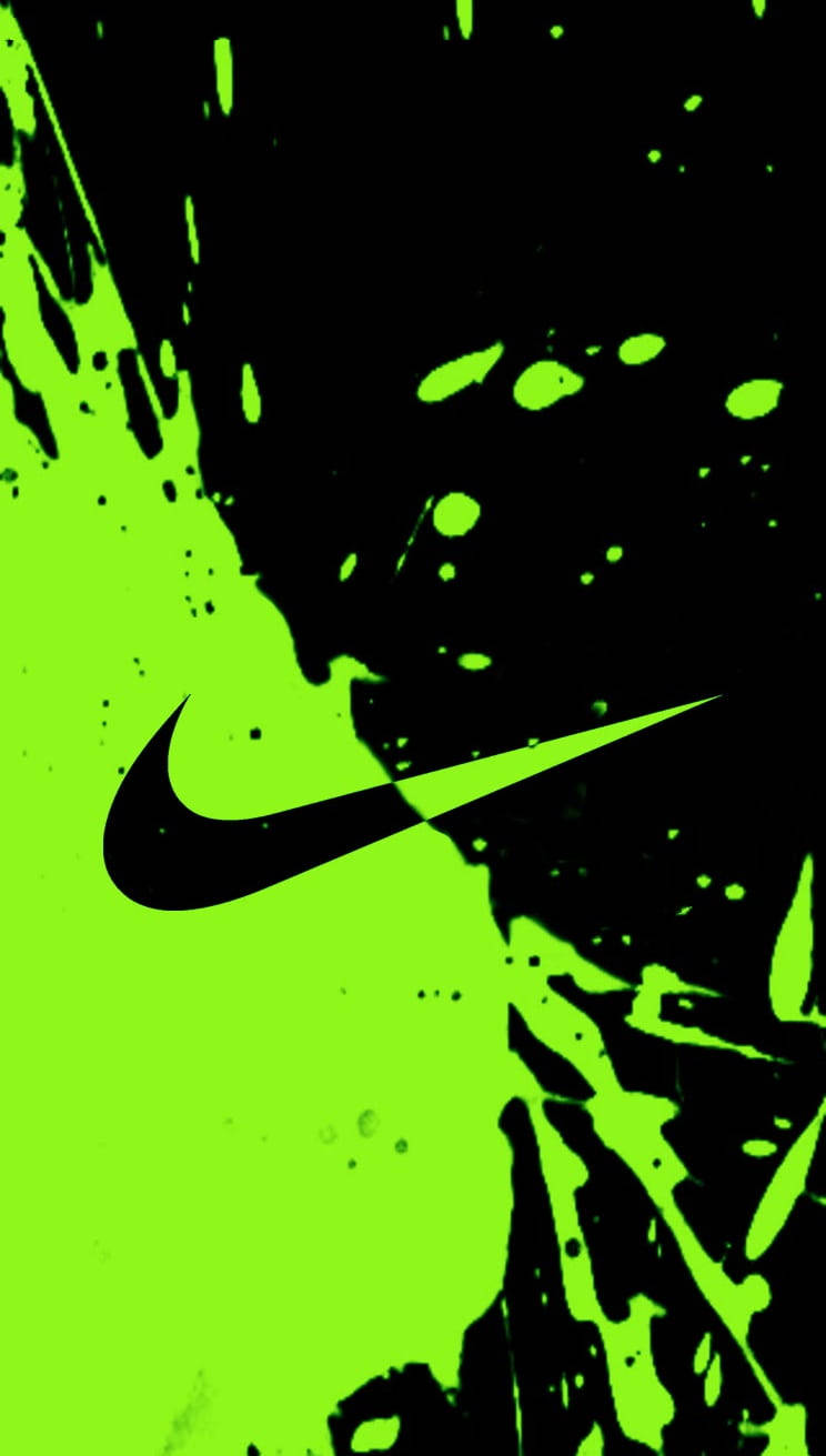 Swoosh 桌布 壁紙 — 一個大膽的黑色Nike勾勾在充滿活力的螢光綠色潑濺背景上脫穎而出。