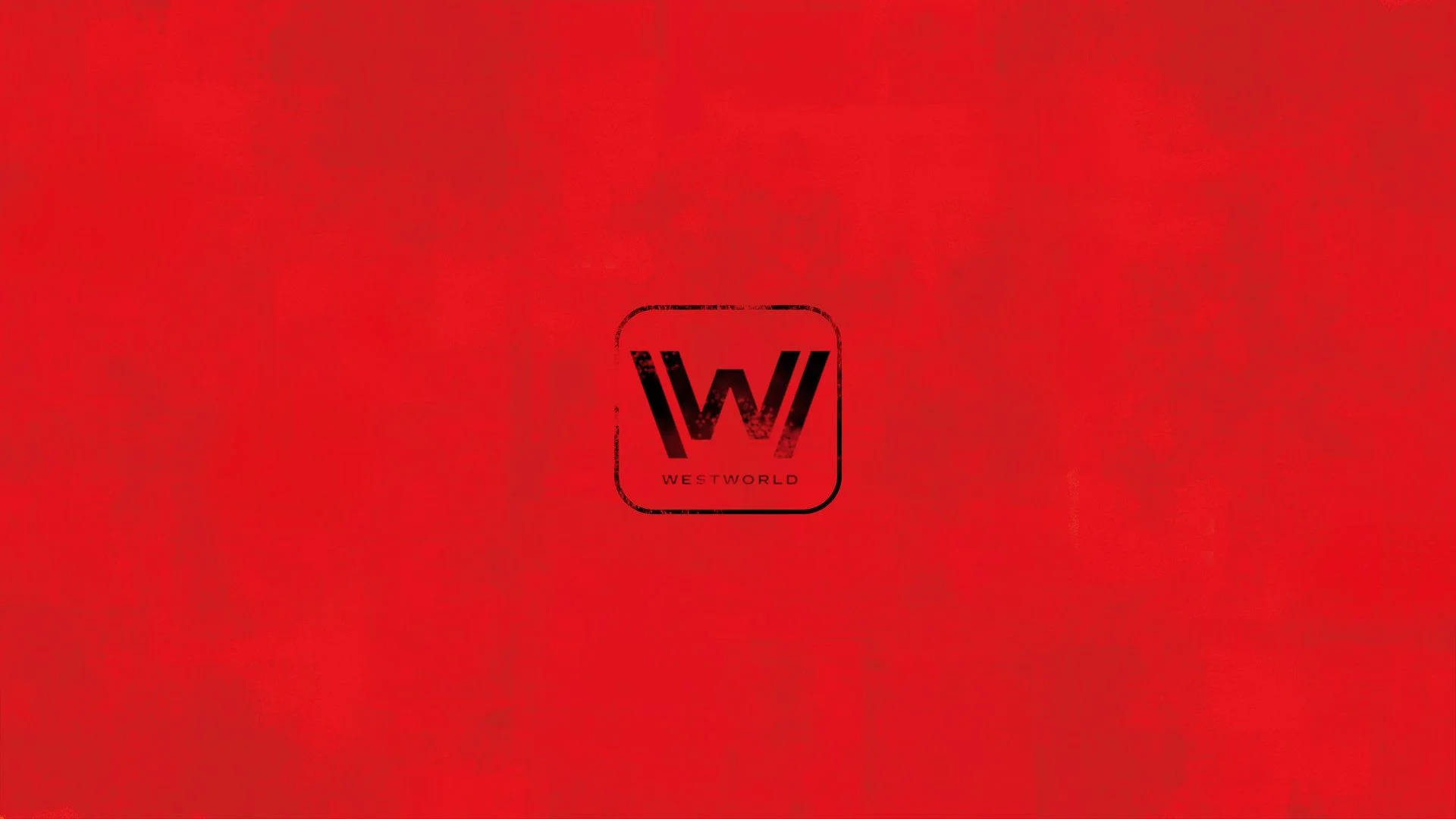 Westworld 桌布 壁紙 — 一個大膽的黑色Westworld標誌居中在帶有紋理的深紅色背景上。