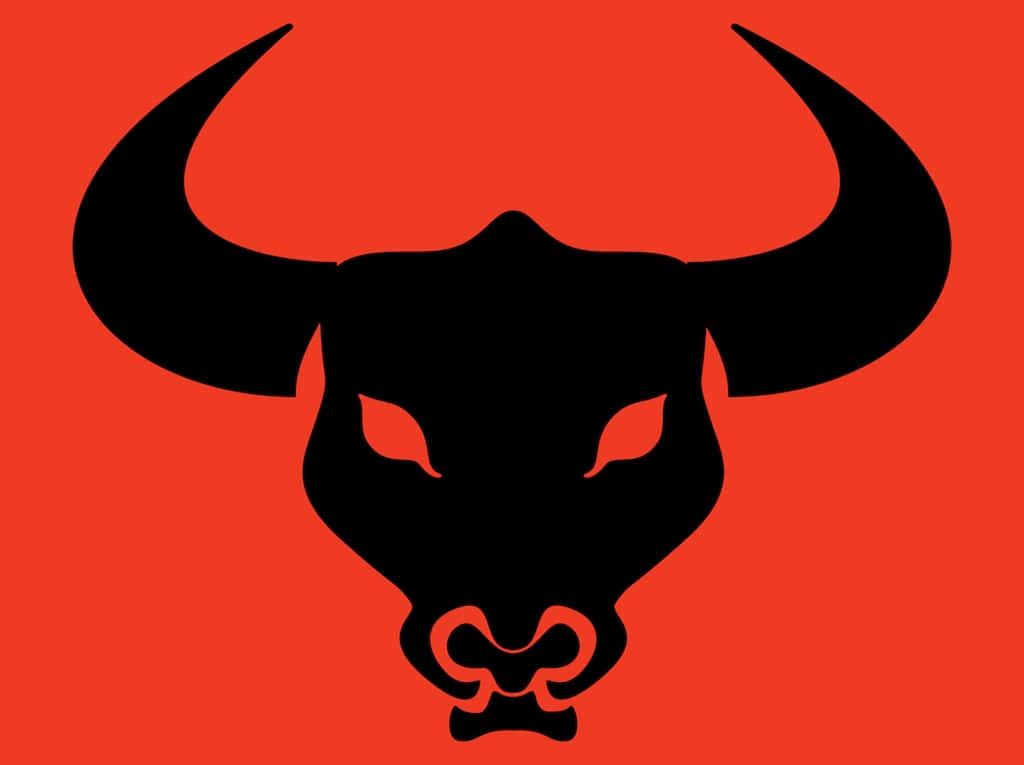 Bull Head 桌布 壁紙 — 一個大膽的黑色公牛頭剪影，帶有發光的紅色眼睛，在純紅色背景上直視前方。