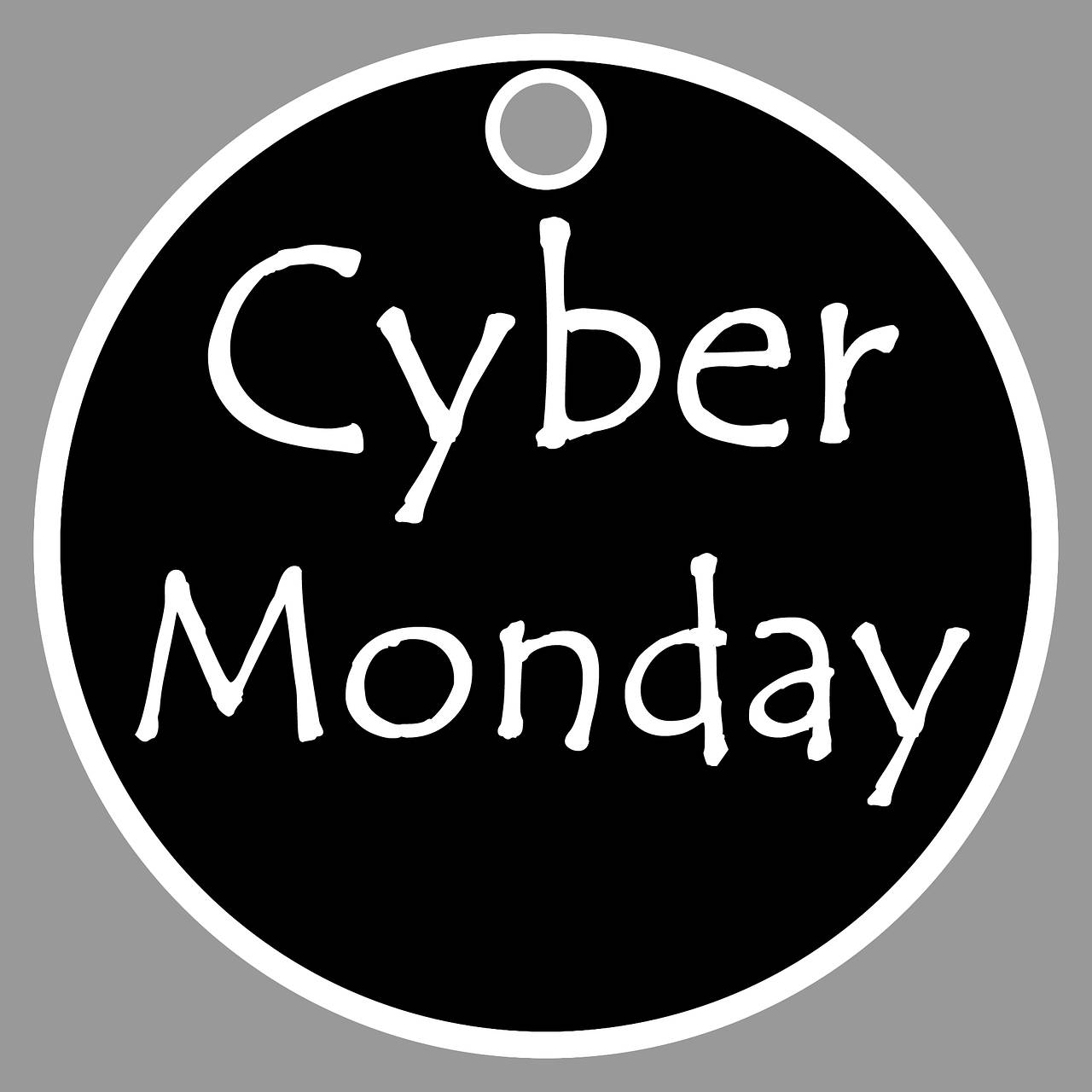 Monday 桌布 壁紙 — 一個大膽的黑色圓形徽章，灰色背景上有白色手寫的「Cyber Monday」文字。