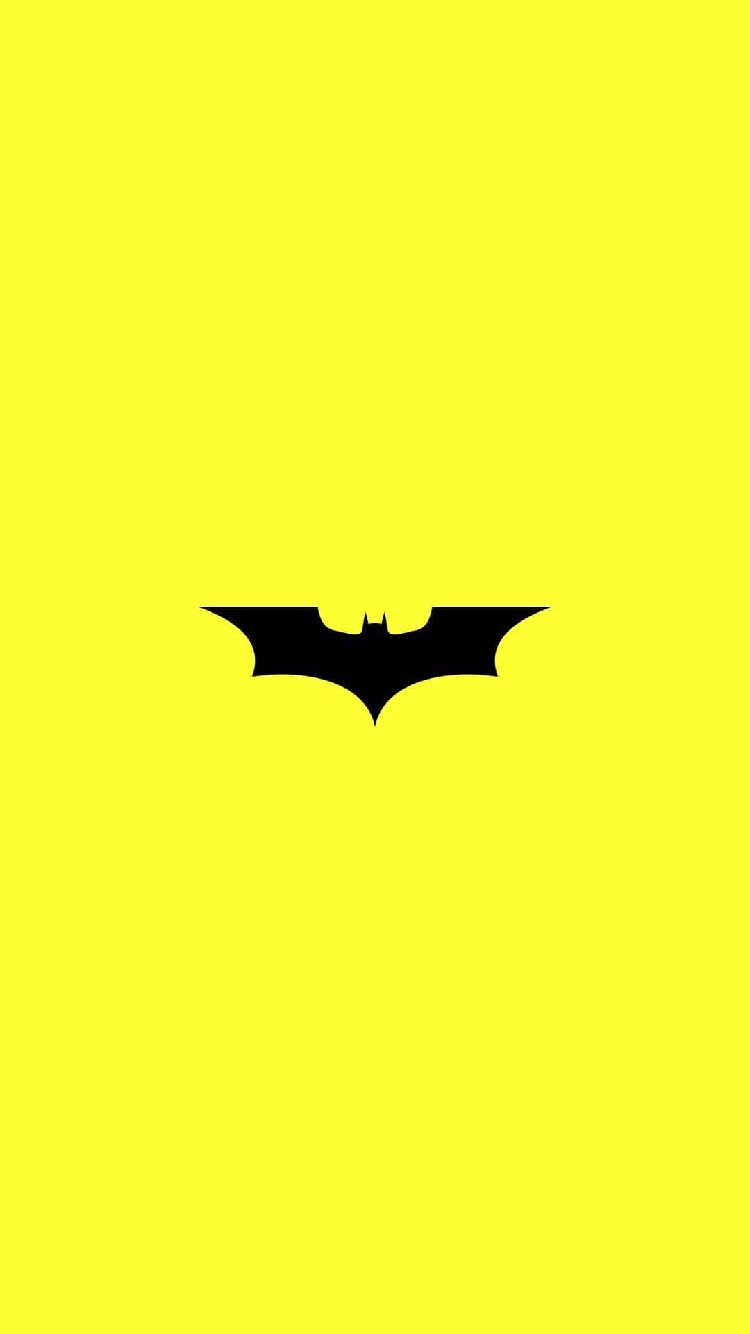 Batman Aesthetic 桌布 壁紙 — 一個大膽的黑色蝙蝠符號，居中在鮮豔的黃色背景上。