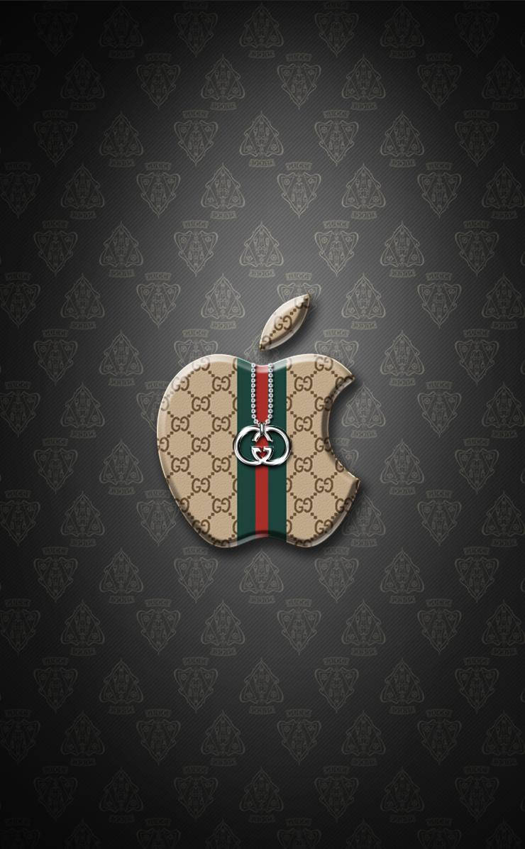 Gucci iPhone 桌布 壁紙 — 一個奢華Gucci圖案的Apple標誌，帶有紅綠條紋和交織的G徽章，居中在深灰色紋理背景上。