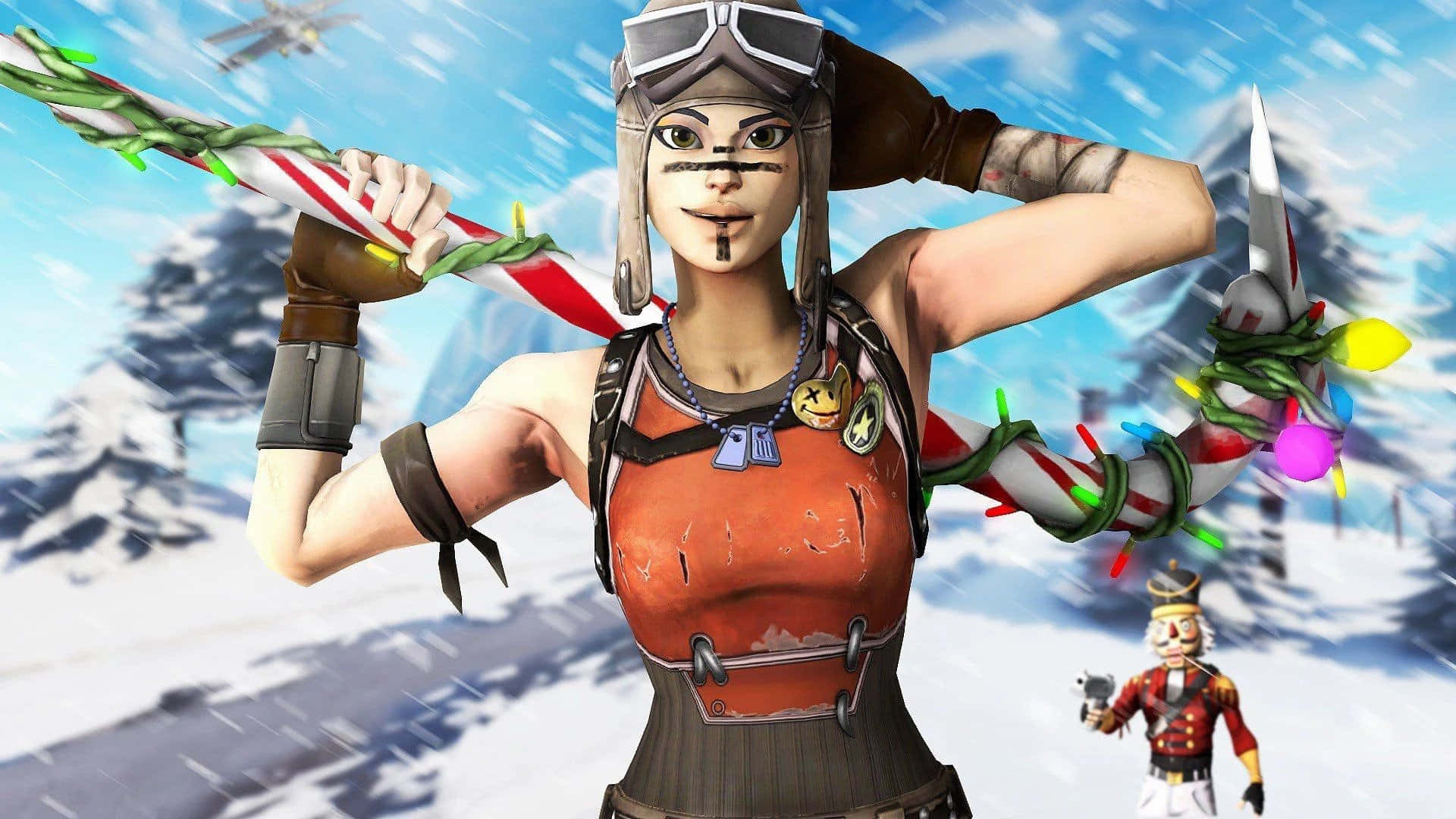 Fortnite 桌布 壁紙 — 一個女性遊戲角色穿著冬季裝備，在雪山背景下揮舞節日糖果杖武器。