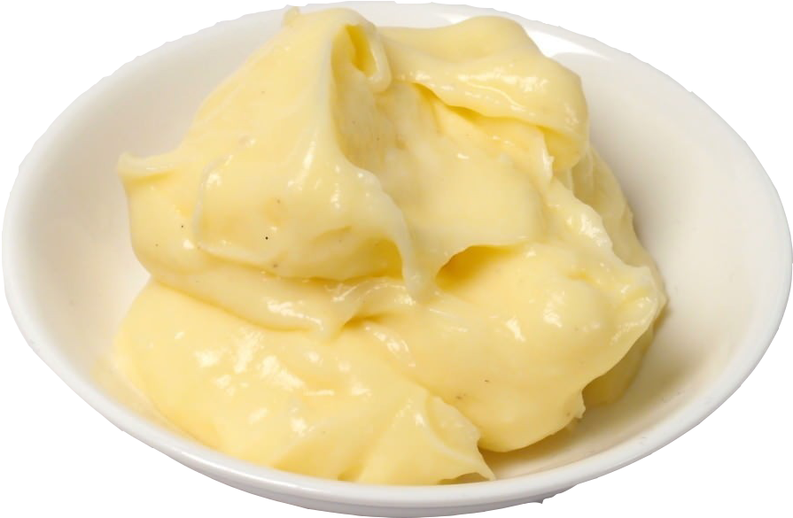custard 桌布 壁紙 — 一個奶油淺黃色醬汁，帶有光澤的頂峰，放在一個白色碗裡，背景是黑色。