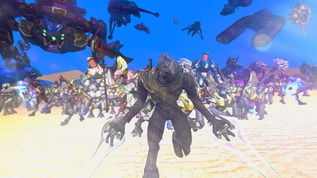 Halo Covenant 桌布 壁紙 — 一個威脅性的外星戰士站在沙漠戰場上，發光的機甲和裝甲士兵在明亮的藍天下戰鬥。