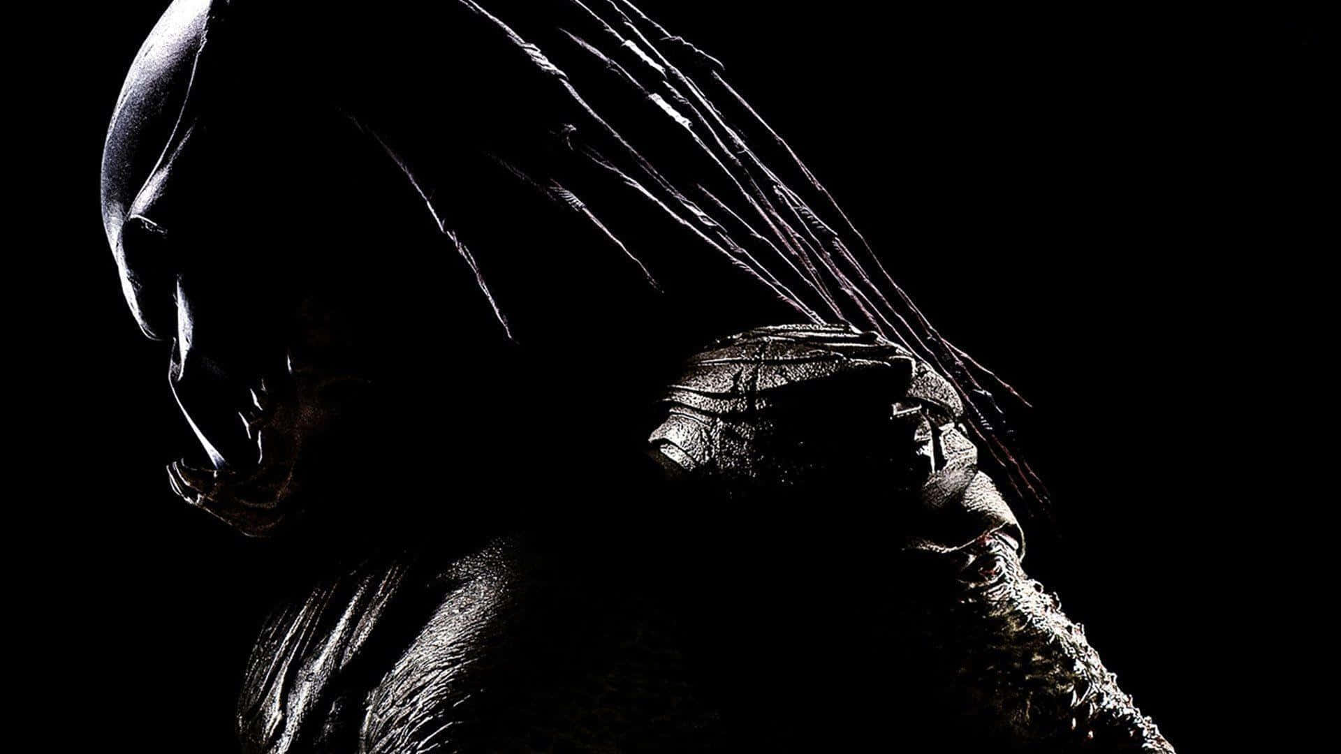 Mortal Kombat X 桌布 壁紙 — 一個威脅性的鐵血戰士戰士剪影，背景是黑色虛空，銳利的光線突出其辮子頭和裝甲肩膀。