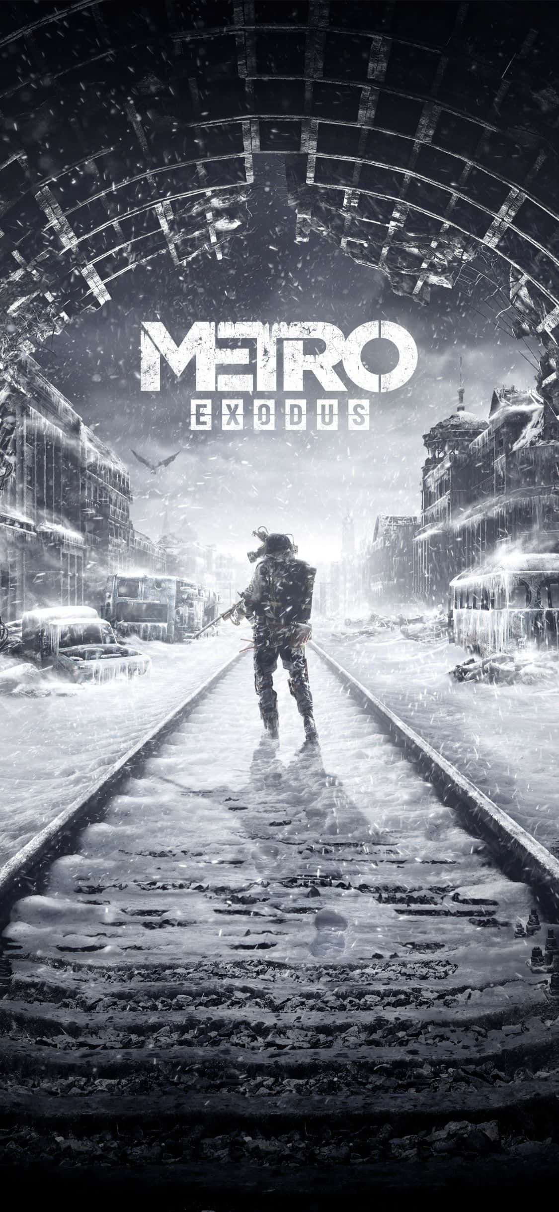 iPhone X Metro Exodus 桌布 壁紙 — 一個孤獨的倖存者在破拱門下的火車軌道上走過被雪覆蓋的廢墟城市景觀。