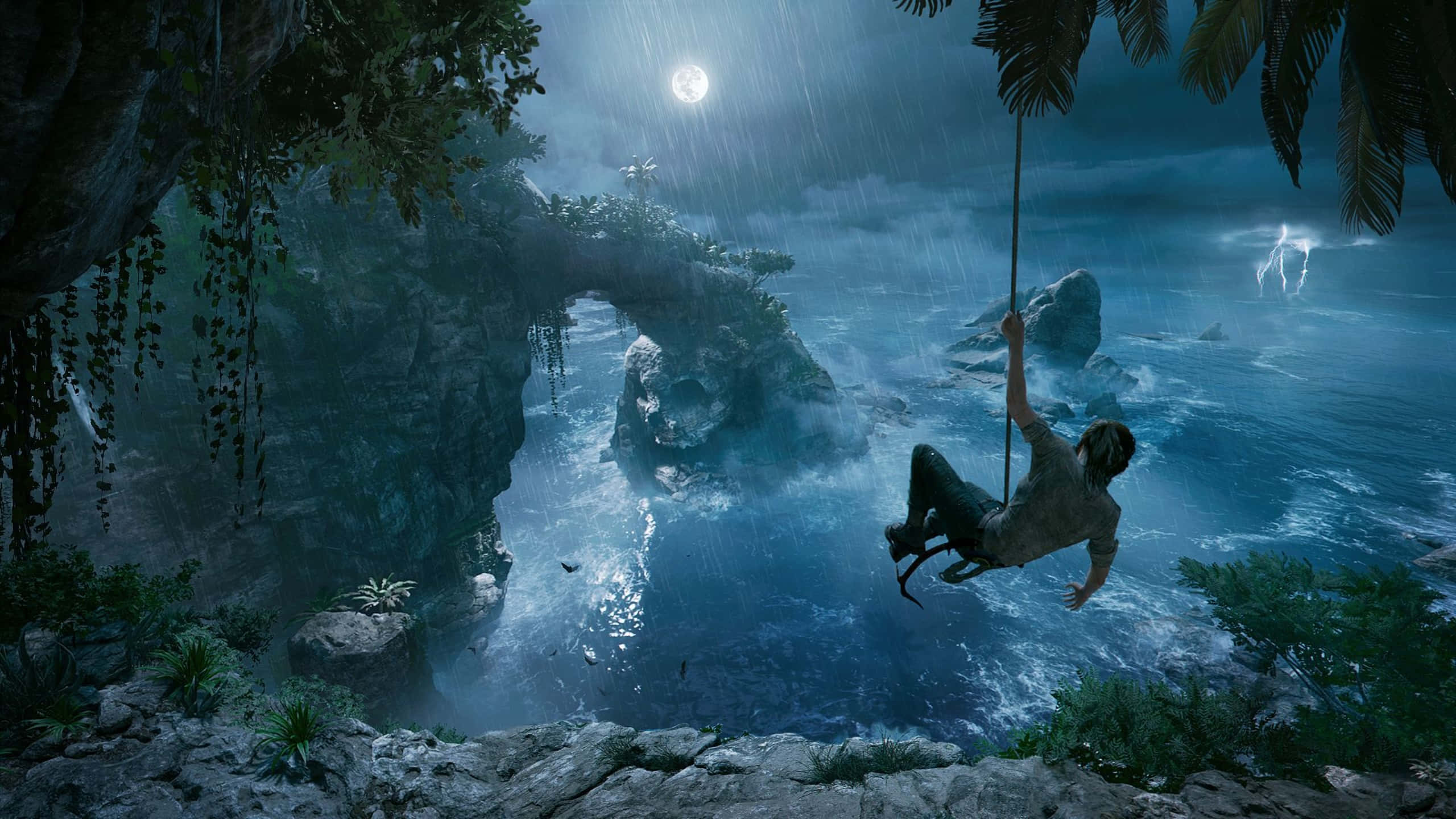 1440p Shadow Of The Tomb Raider 桌布 壁紙 — 一個孤獨的冒險家在閃電交加的暴風雨天空下，在月光照耀的海洋上盪著繩索。