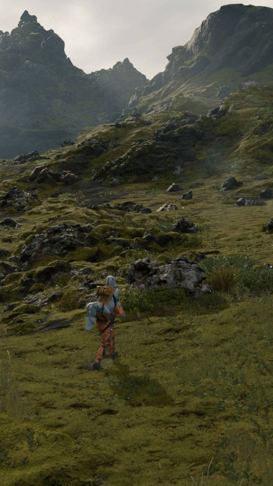一個穿著彩色盔甲的冒險家走過長滿苔蘚的山地景觀。 — 死亡擱淺 GIF 壁紙