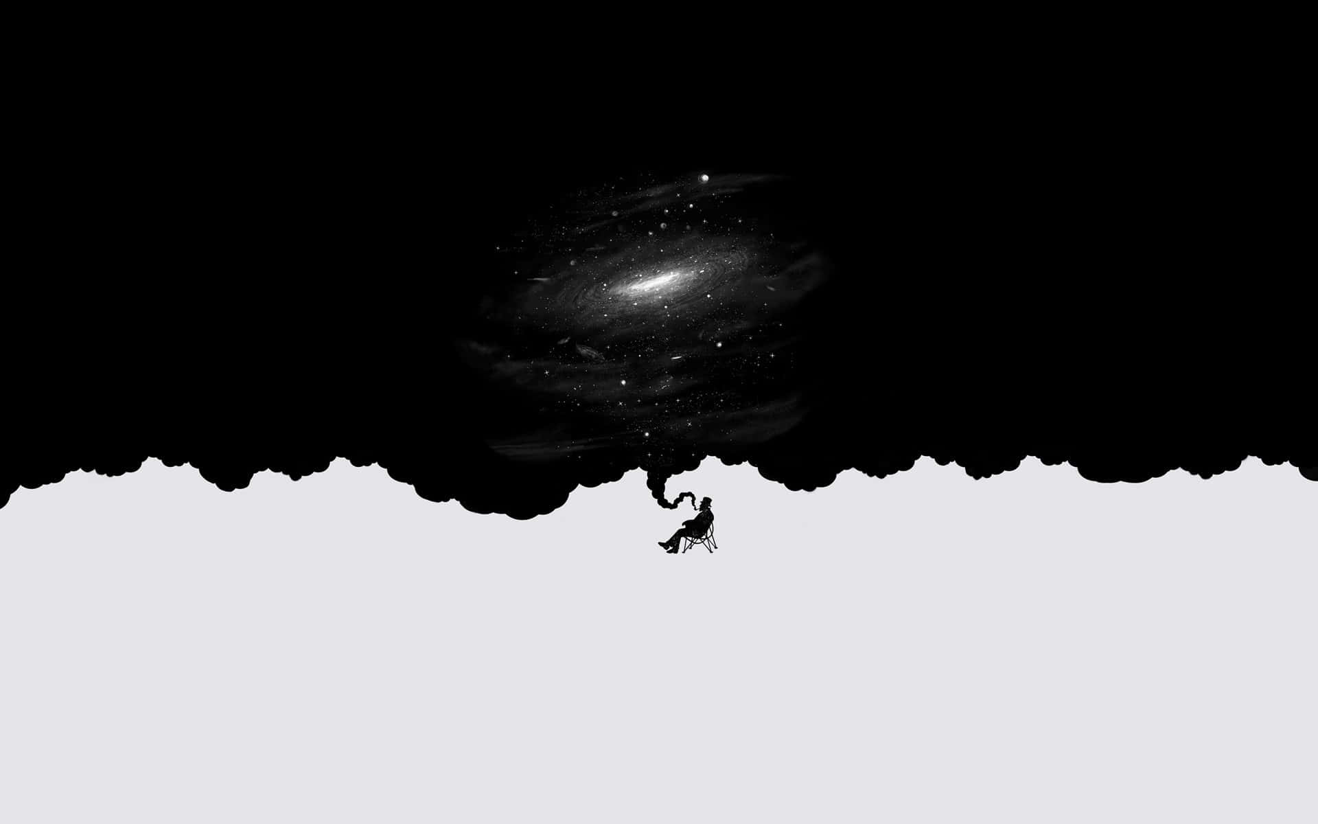 Minimalist Black And White 桌布 壁紙 — 一個孤獨的剪影坐在椅子上，下方是廣闊的宇宙星系，在鮮明的黑白背景下發光。
