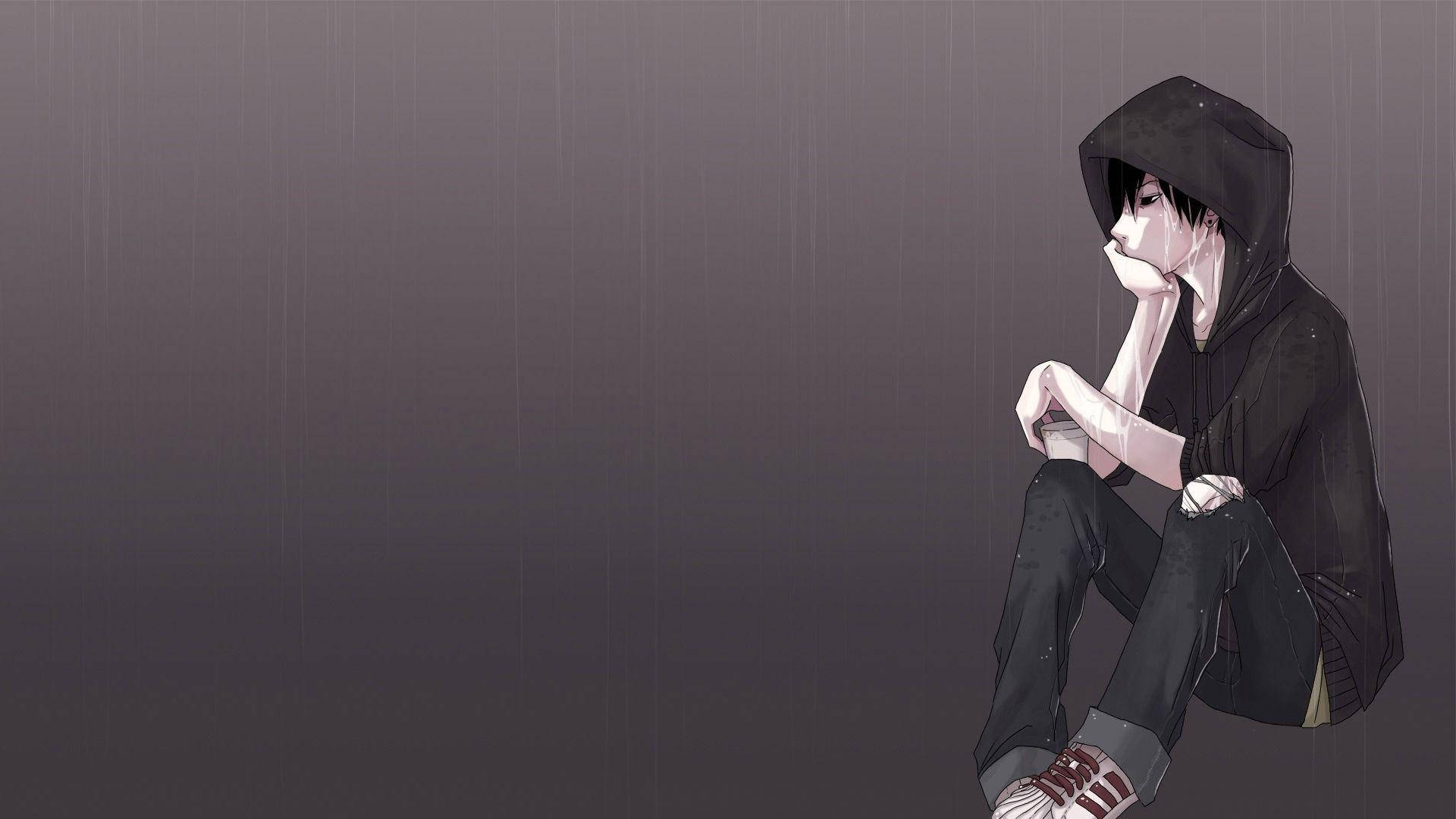 emo 桌布 壁紙 — 一個孤獨的動漫少年穿著黑色連帽衫，在灰色的雨中彎腰坐著，手托下巴，在單色背景下陷入沉思。