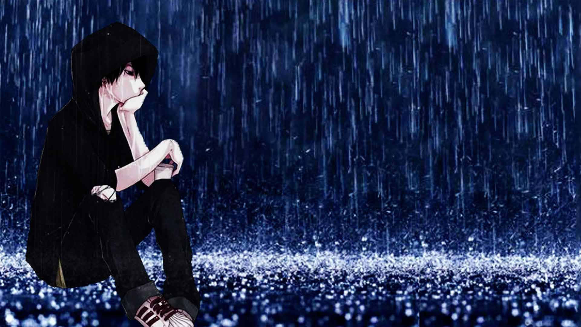 Dark Emotional 桌布 壁紙 — 一個孤獨的動漫角色穿著黑色連帽衫，在傾盆大雨中沉思地坐著，周圍是閃閃發光的藍色雨滴。