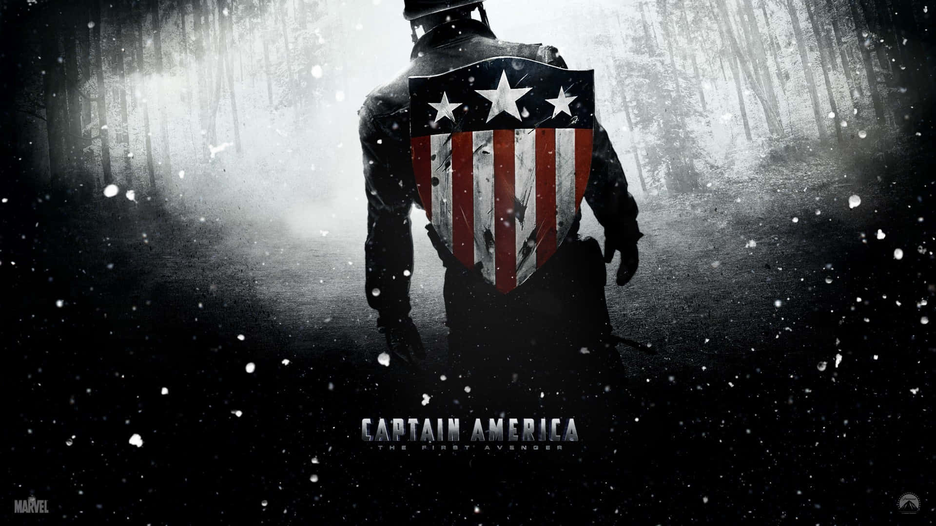 Captain America Movie 桌布 壁紙 — 一個孤獨的美國隊長在雪森林中背光站立，手持他標誌性的盾牌，雪花在他周圍飄落。