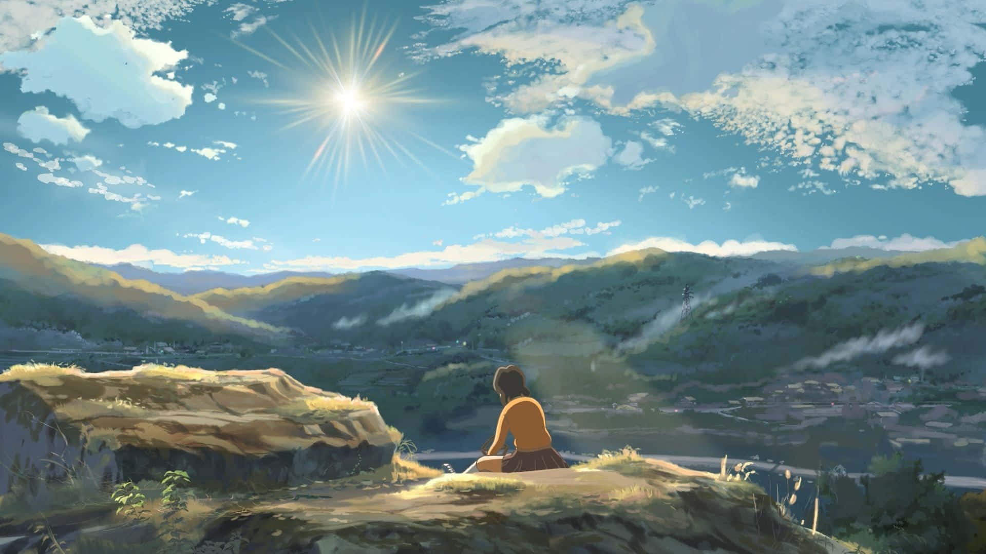 Aesthetic Nature 桌布 壁紙 — 一個孤獨的身影坐在陽光普照的懸崖上，俯瞰著山谷，山谷中有起伏的丘陵和遠處的小鎮，天空湛藍，白雲朵朵。