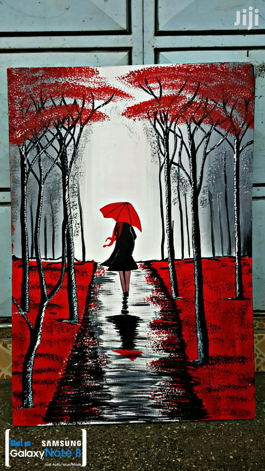 Beautiful Art 桌布 壁紙 — 一個孤獨的身影撐著紅傘，在蒼白的天空下，沿著濕漉漉的小路穿過一片黑色樹木、樹冠鮮紅的森林。