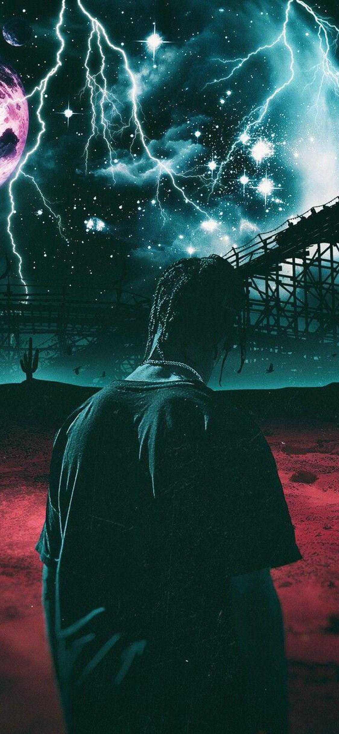 Astroworld 桌布 壁紙 — 一個孤獨的身影站在超現實的沙漠中，頭頂是風暴般的宇宙天空，閃電和星星交織。