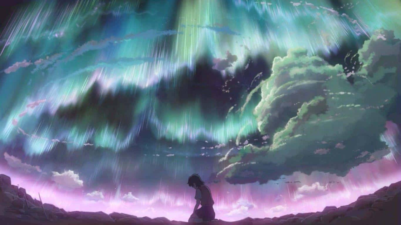 Makoto Shinkai 桌布 壁紙 — 一個孤獨的身影跪在岩石地形上，在風暴天空中舞動的鮮綠色和紫色極光之下。