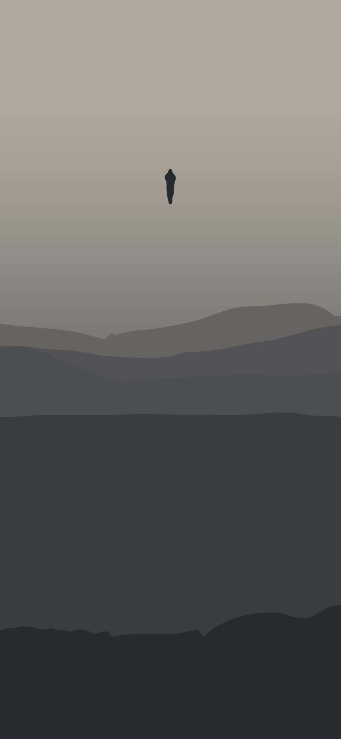 iPhone Xs Death Stranding 桌布 壁紙 — 一個孤獨的黑色剪影漂浮在層疊的山脈之上，天空呈現柔和的漸變色。