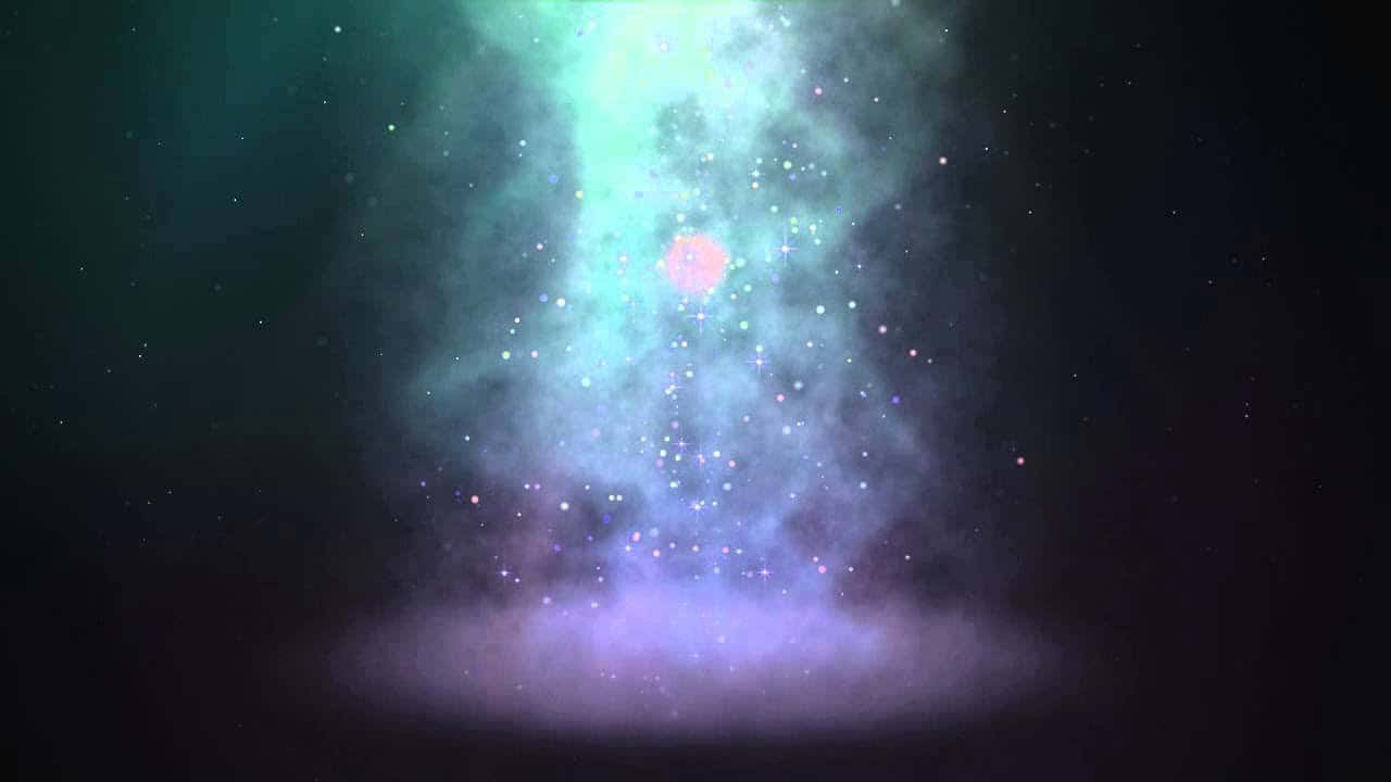 一個發光的宇宙星雲，帶有星星和紫色青綠色的雲朵。 — 影片 GIF 壁紙