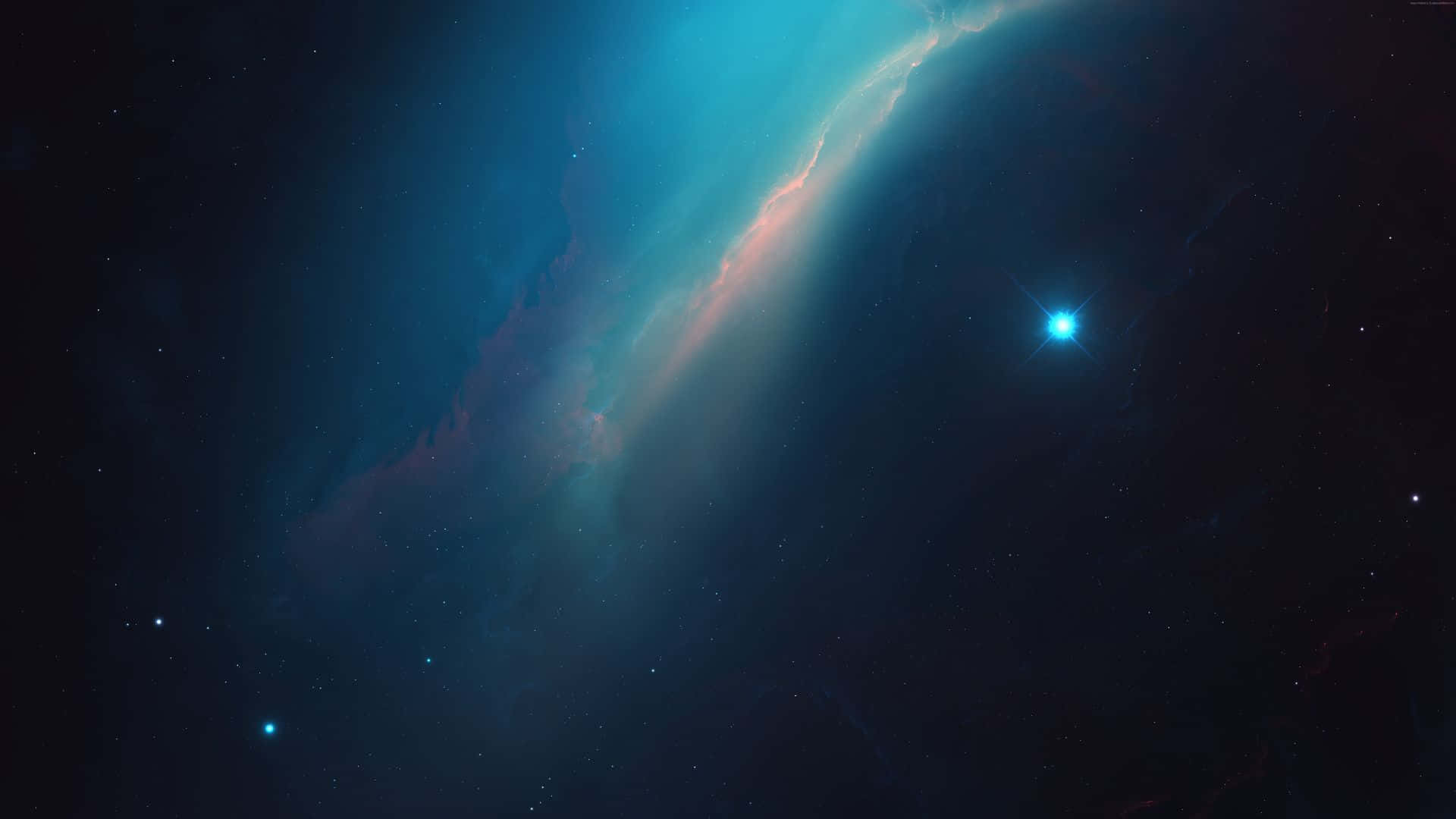 桌布 壁紙 — 一個宇宙星雲在佈滿星星的黑色虛空中旋轉，呈現鮮豔的青綠色和粉紅色，附近有一顆明亮的藍色星星閃耀。