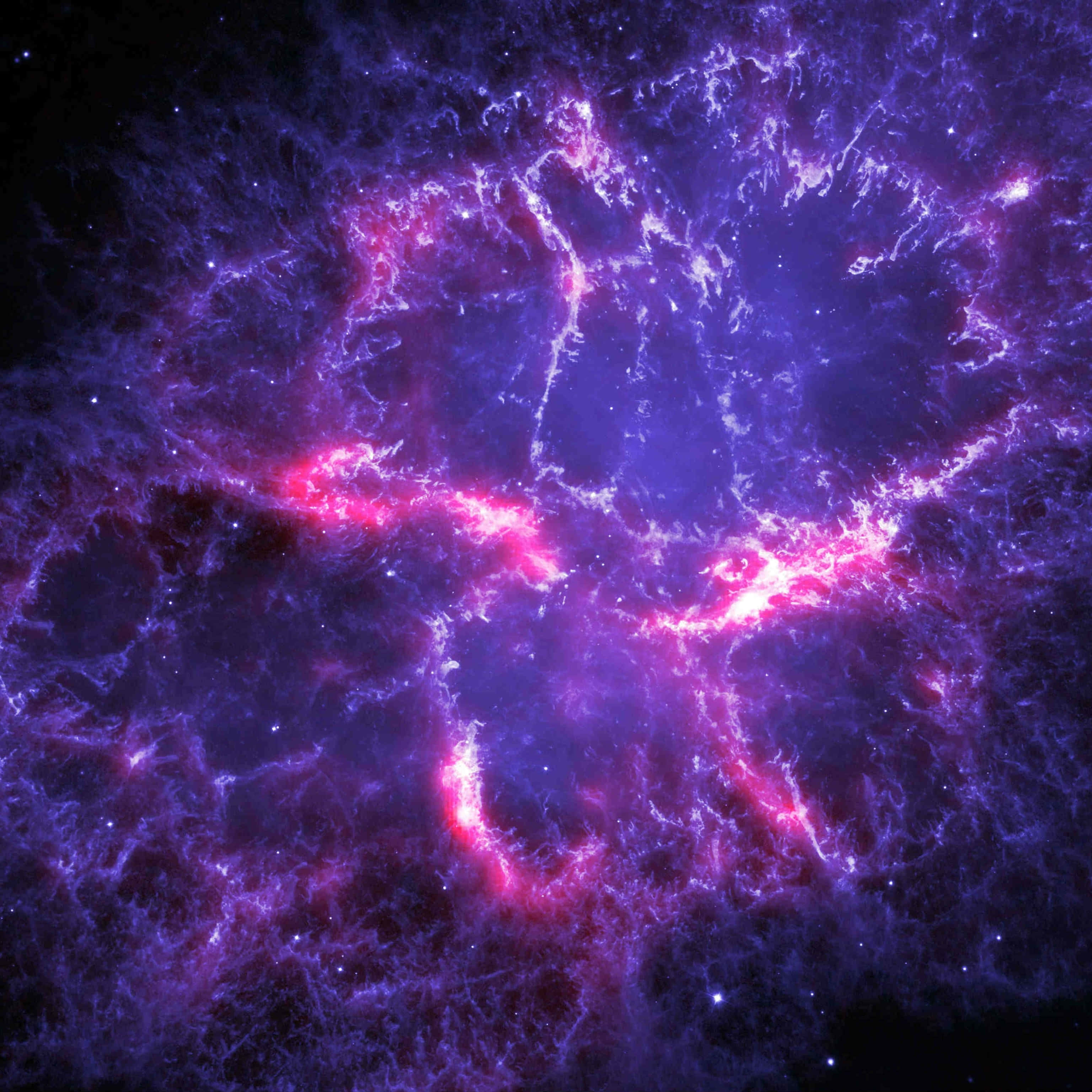 awesome cool 桌布 壁紙 — 一個宇宙星雲在佈滿星星的黑色虛空中旋轉，帶有鮮豔的粉紅色和深紫色氣體。
