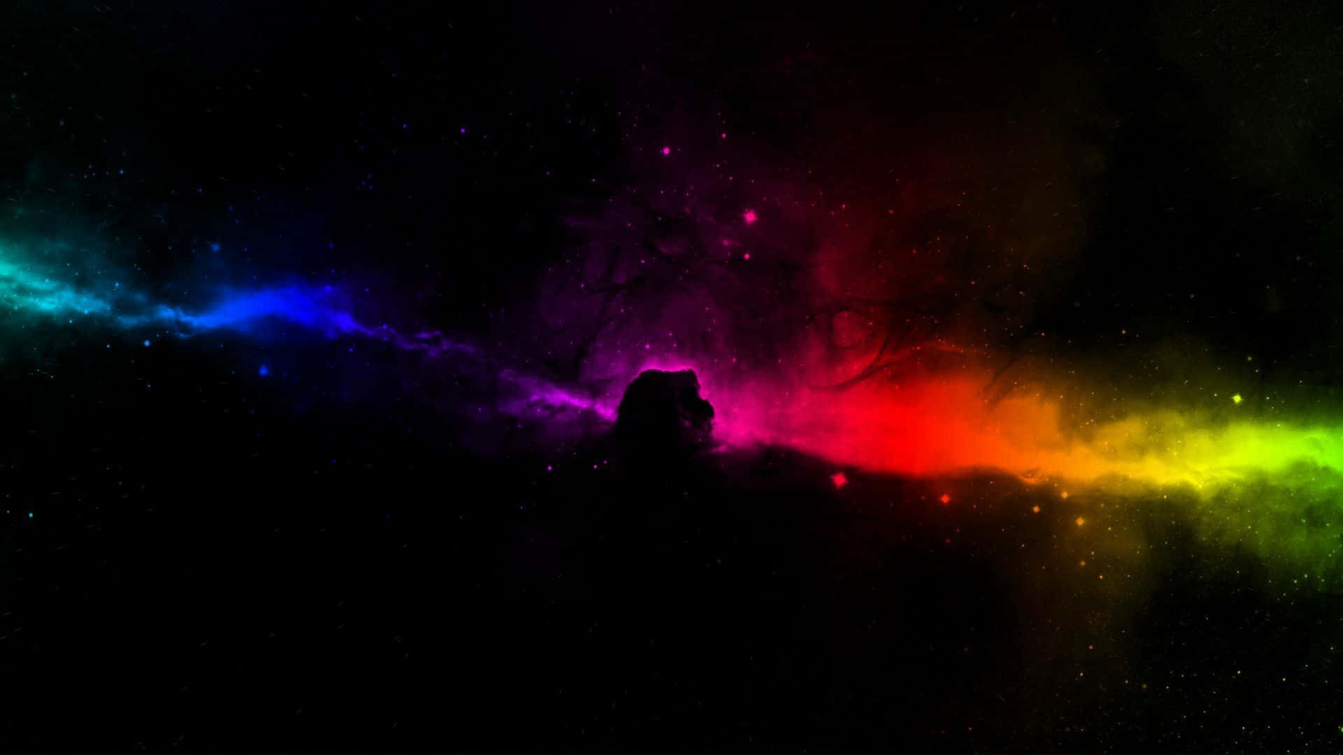 RGB 桌布 壁紙 — 一個宇宙星雲在星空中展現出鮮豔的彩虹漸變，前景是山脈的黑色剪影。