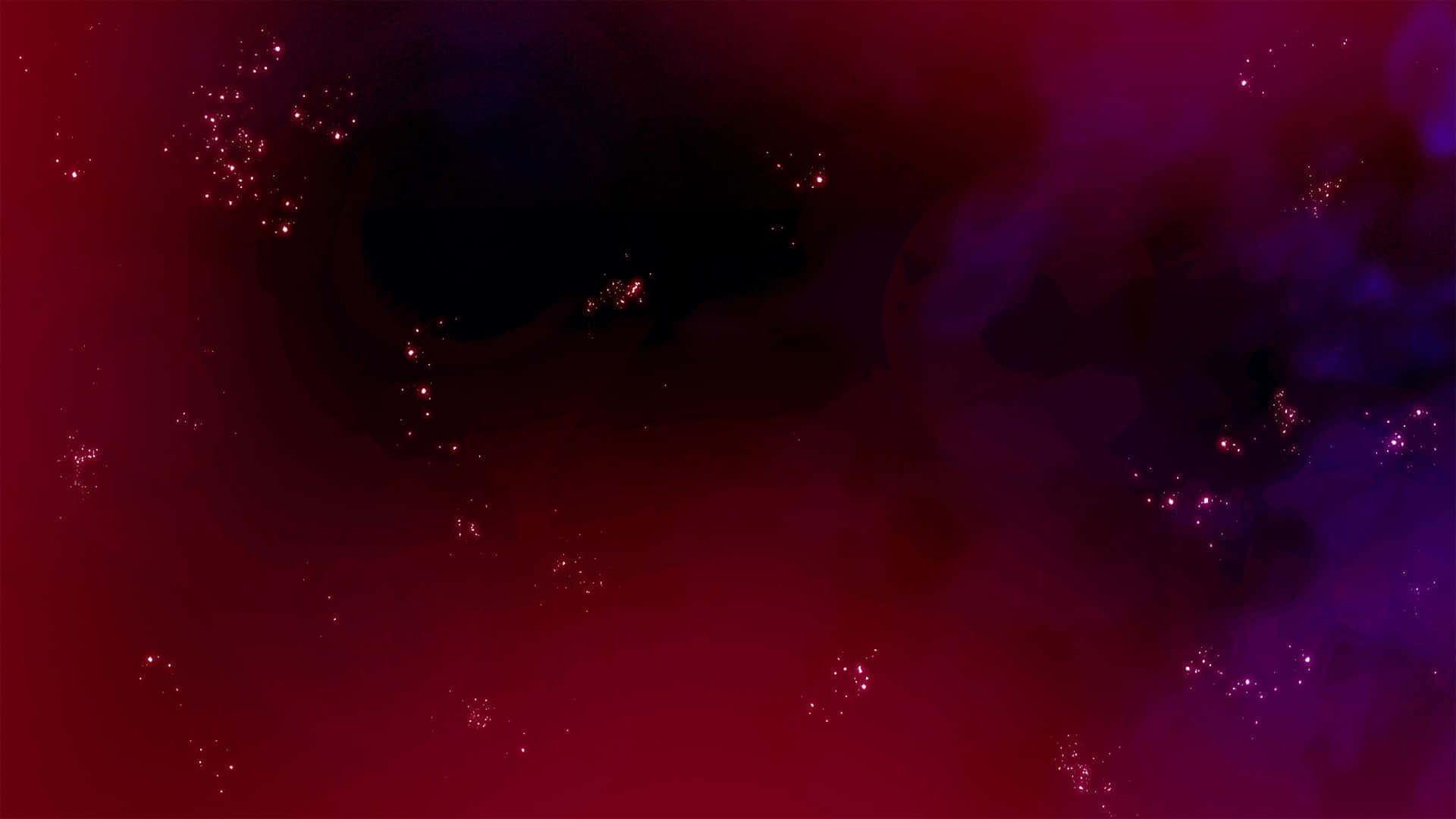 Red Space 桌布 壁紙 — 一個宇宙星雲在深紅色和紫色中旋轉，散落的發光星星點綴在黑暗虛空之中。
