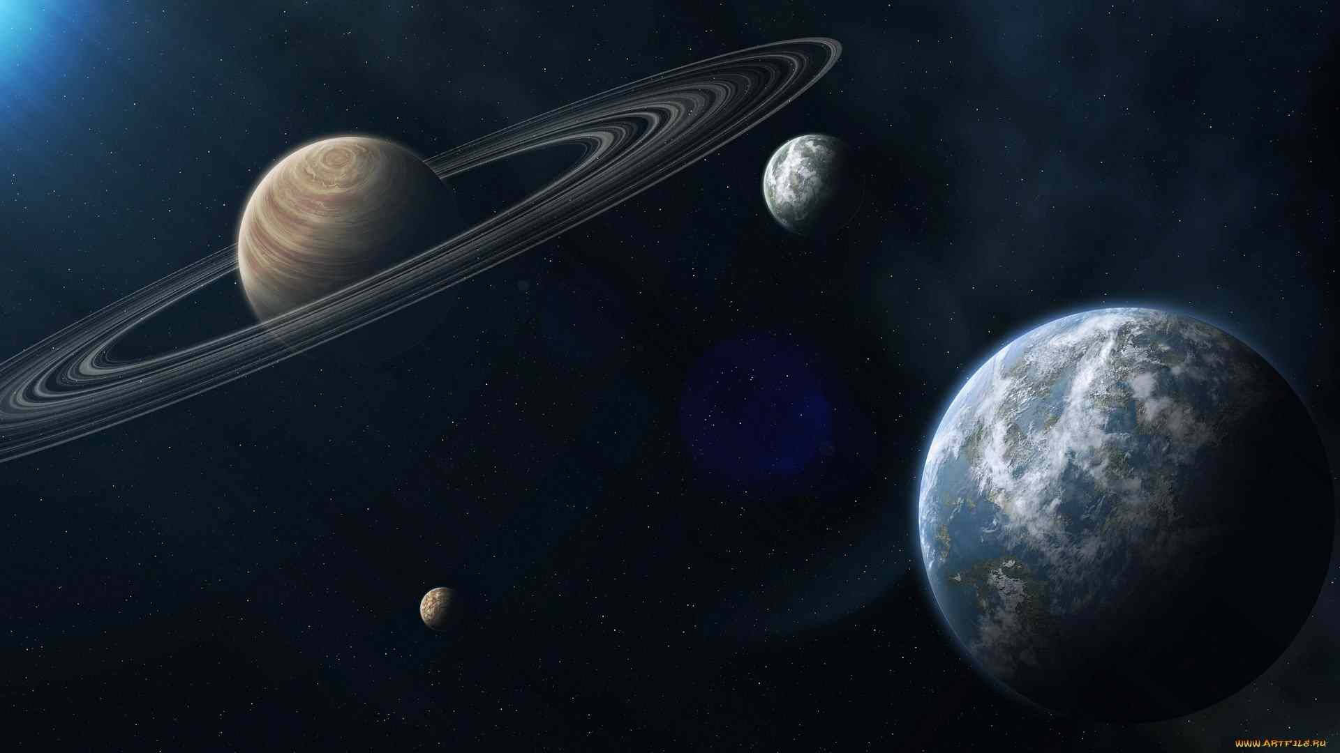 木星 桌布 壁紙 — 一個宇宙景觀，展示帶有光環的土星、地球和其他行星漂浮在星空之中。