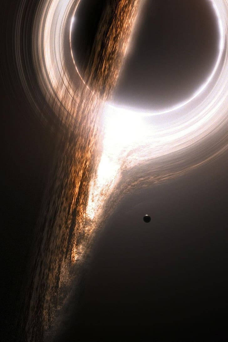深空中帶有旋轉吸積盤的黑洞 — 外太空 GIF 壁紙