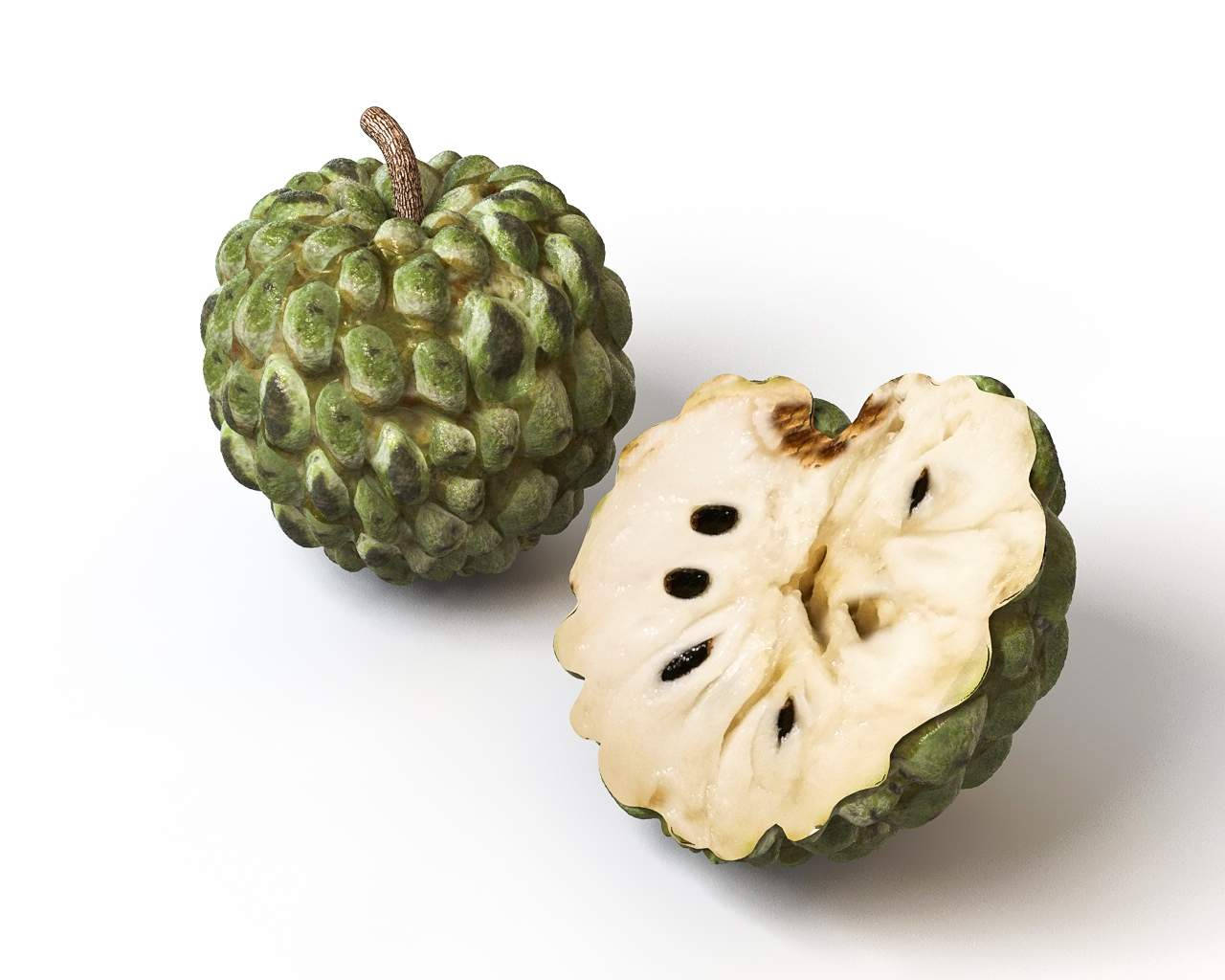 Fruit 桌布 壁紙 — 一個完整和切半的牛心果，表面有凹凸不平的綠色外皮，奶油白色的果肉帶有黑色種子，置於純白背景上。